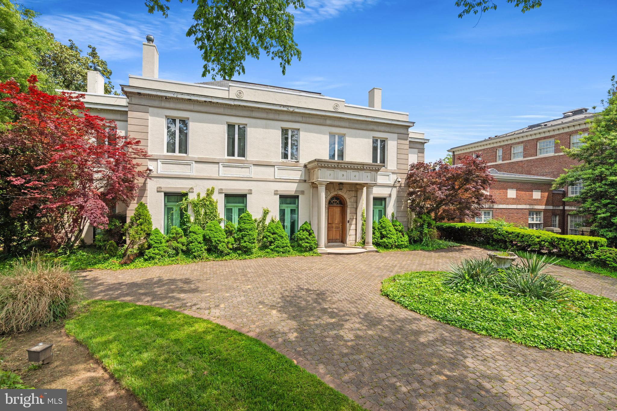 An extremely rare opportunity to purchase an iconic Mass Ave Heights home on Embassy Row. This prestigious property was originally constructed in 1919 and is available for sale for the first time in 50 years. Most recently used as a chancery, the property stands as a rare blank canvas for restoration or reinvention—an architectural gem ready to be revived for a new era of significance.Boasting over 11,000 sq/ft of living space on a .35 Acre lot in the heart of DC, the home currently has 8 bedrooms, 7 bathrooms and various ballrooms and staterooms for entertaining. The rear exterior transports you out of the city and into a serene and private backyard with an existing pool and pool house. An attached three car garage stands in addition to a circular driveway with access from Massachusetts ave and 30th street NW. All appointments must be scheduled 24 hours in advance and listing agents must accompany.*All photos contained in this listing have been digitally enhanced*