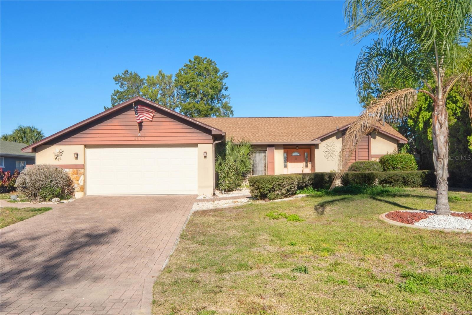 Florida Living at Its Finest- Enjoy year-round swimming and sunshine in this beautifully maintained 2-bedroom, 2-bathroom, 2-car garage home featuring a heated, saltwater pool and a brand-new 2025 roof. Interior Highlights-Open great room layout with pocket sliders leading to the lanai. Formal dining room perfect for gatherings. Upgraded kitchen with abundant cabinetry, stainless steel appliances, granite countertops, and a cozy breakfast nook overlooking the fenced backyard. Split bedroom floor plan for added privacy. Luxurious primary suite with double closets and an en-suite bath featuring dual sinks and a standalone shower. Spacious second bedroom with a large walk-in closet. Convenient laundry room with washer, dryer, and utility sink. Hall bath with oversized linen closet. Outdoor & Pool Features-Large screened-in lanai with vinyl windows for year-round enjoyment. Resurfaced heated/cooled saltwater pool (2021) with updated screening. Energy-efficient variable-speed pool pump. Fenced backyard for privacy and pets. AC replaced in 2018. Some furnishings available for purchase.