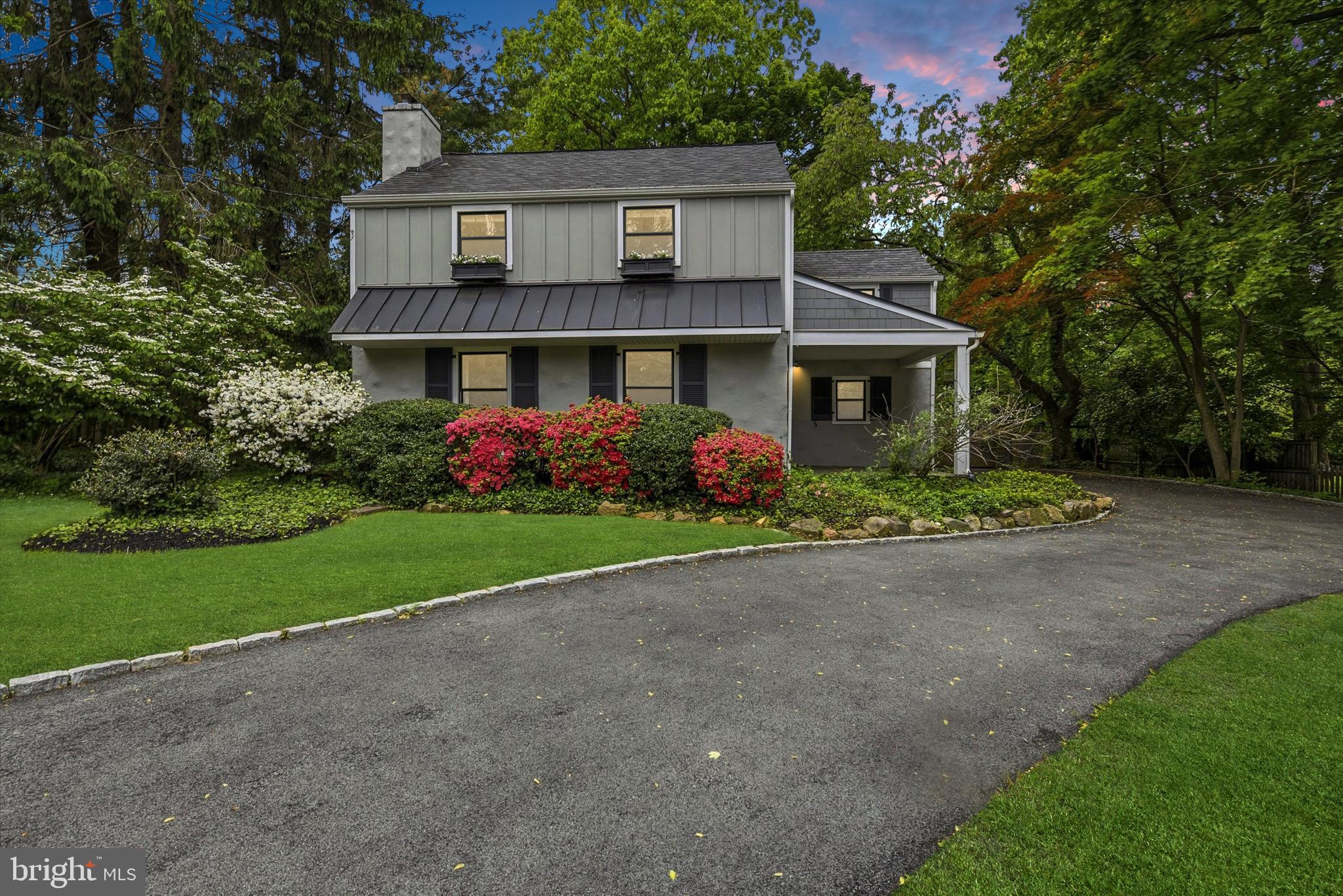 Welcome to this beautifully maintained and thoughtfully updated 3-bedroom, 2 full and 1 half bath home in the highly sought-after Tredyffrin-Easttown School District. Set back with a charming circle driveway, mature landscaping, and a covered front porch, this home offers wonderful curb appeal and an easy, welcoming entrance in every season.The heart of the home is the stunning kitchen, where the ceilings have been opened and enhanced with skylights, exposed beams, and a vaulted shiplap-style ceiling that creates a bright and inviting gathering space. A large center island offers exceptional prep space and storage, with a built-in beverage refrigerator on one end and a microwave on the other. The kitchen also features abundant counter space, generous cabinetry, a coffee bar/wet bar area, and a sink overlooking the flat, fenced rear yard.Just off the kitchen, the formal dining room features hardwood floors and provides a comfortable space for everyday meals or entertaining. The front room, originally the family room, includes a fireplace and built-in shelving, making it a flexible space that could serve as a formal living room, playroom, office, or second den.The sunroom is truly a standout feature of this home, offering vaulted ceilings, skylights, built-ins, and charming brick flooring. Recently enhanced with a mini-split system, this room is comfortable and inviting while creating a wonderful connection to the outdoors.The former garage has been converted into a spacious laundry room with access to the basement, adding function and convenience. A half bath completes the main level. (not included in the square footage)Upstairs, you’ll find three bedrooms and two full baths, including a beautifully designed added bath with dual sinks. Each space reflects the care and updates this home has received over the years.Outside, enjoy a flat, fenced rear yard with paver patio areas, perfect for relaxing, entertaining, play, pets, or gardening. The covered front porch is another charming spot to enjoy morning coffee or unwind at the end of the day.The location is exceptional — minutes to Devon Prep, Terrain, Whole Foods, the Devon Horse Show, the Devon Train Station, and all that the Main Line has to offer. Additional updates include AC and furnace in 2018, along with replaced siding and a metal roof.A warm, well-cared-for home in a premier Devon location — this one is truly special.