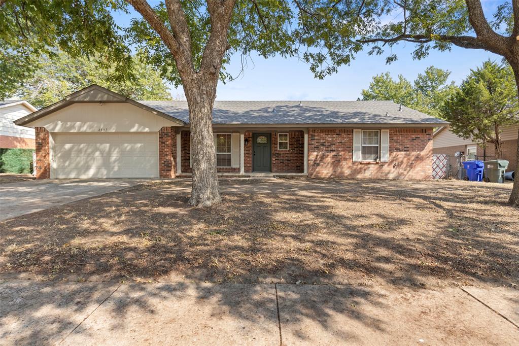 Beautifully remodeled 3-bedroom, 2-bath ranch-style brick home located on a tree-lined street just minutes from the OU campus. This home offers a great layout with two living areas and a beautiful fireplace as the centerpiece of the main living room. The fully updated kitchen features quartz countertops, stainless steel appliances, and plenty of cabinet space.Both bathrooms have been completely updated with modern finishes, and the spacious primary suite includes a large en suite bathroom. New vinyl flooring and carpet run throughout the home, along with updated fixtures and finishes. Outside, enjoy a large backyard with plenty of room for entertaining, relaxing, or play. A great combination of location, space, and a full remodel, all close to OU, shopping, dining, and everything Norman has to offer.
