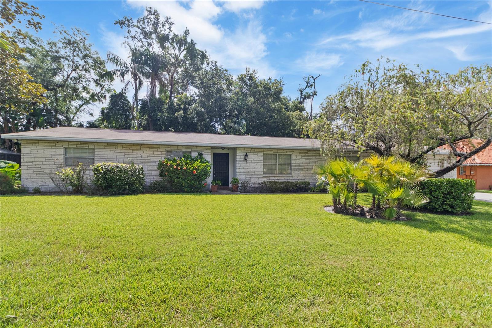 Don’t miss this rare opportunity to own in one of Lutz’s most desirable and rarely available neighborhoods! This lovingly maintained 3-bedroom, 2-bath home sits on a spacious, beautifully landscaped lot with no HOA and an incredibly convenient location just off N. Florida Avenue.

Featuring a large two-car garage, an updated primary bathroom, and ownership by just one meticulous original owner, this home offers charm, comfort, and long-term value. The gorgeous screened-in back patio is perfect for relaxing or entertaining year-round.  

One of the things I love most about this home is how thoughtfully it's laid out — it truly offers space for every part of life. There's a formal dining room that’s perfect for holiday dinners and hosting special occasions, a formal sitting room that feels elegant and inviting, and a separate family room/living area that’s perfect for everyday relaxation.

The kitchen is the heart of the home, with a cozy eat-in space that makes mornings feel warm and connected. Whether you're having coffee at sunrise, enjoying a quiet dinner, or entertaining a group, there’s a perfect space for it here.

This home has a timeless feel, with clearly defined rooms that give you flexibility from entertaining to quiet time. This property is being sold with the assistance of Tracie Copeland, a licensed Florida real estate broker and a relative to the seller of the home. Tracie Copeland is acting as a representative for the seller.