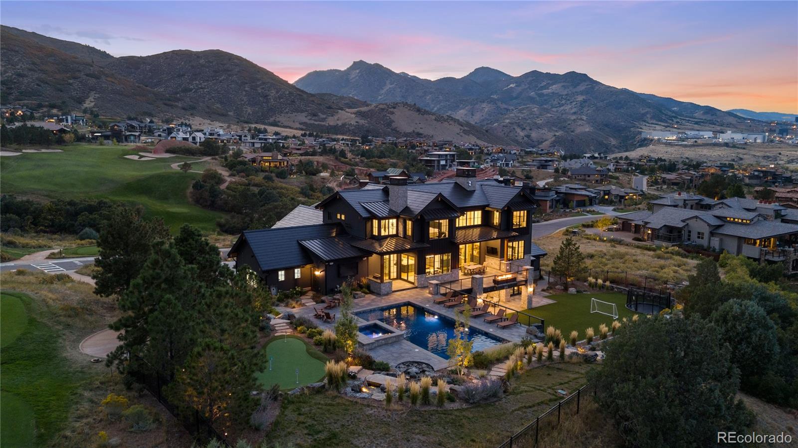 An extraordinary custom residence designed for luxury living and unforgettable entertaining. Perched on a premier lot with breathtaking views of the Colorado foothills, this home features a private backyard oasis with a resort-style pool, spa, and beautifully manicured landscaping. Inside, enjoy a private theater, golf simulator room, and open-concept living areas filled with natural light. The gourmet kitchen, soaring ceilings, and designer finishes throughout set the stage for everyday elegance. This smart, energy-efficient home also includes a Tesla solar tile system with backup power, blending sustainability with style. Whether hosting friends or enjoying a peaceful sunset, this home offers the perfect balance of sophistication and serenity. A rare opportunity to own one of the most sought-after properties in the neighborhood.