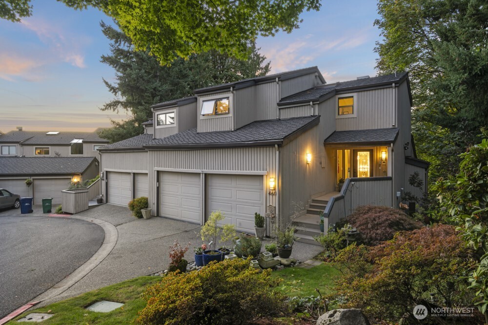 Don't miss out on this opportunity to own a home in Kirkland's highly desired Houghton neighborhood with stunning lake views at an incredible price! Located in the exclusive Yarrow Hill gated community, this home is surrounded by serene natural landscapes, while still within walking distance to the shops and restaurants at Carillon Point Marina, direct access to the Cross Kirkland Corridor, and a very close commute to DT Kirkland, Bellevue, and Seattle.      The modern, light-filled spacious interior features high vaulted ceilings, wall-to-wall windows and high-end finishes that punch far above this price point. Private west-facing balcony extends the living space outdoors and is perfect for enjoying the iconic sunsets against the backdrop of the Olympic Mountains (an entertainer's dream!!). The versatile and expansive floorplan design offers plenty of options to customize your ideal living space with an in-home office, gym, guest quarters, etc.     Upgraded features include built-in cabinets, polished granite countertops, fully renovated kitchen w/ Sub-Zero fridge, 2 gas fireplaces, sunroom, and brand-new carpets throughout home. Finished attic & utility room provide ample storage + 2 car garage w/ floor-to-ceiling shelves. HOA fee also includes maintenance of the home's exterior (roof, siding, etc.).     Pre-inspected. Partial virtual staging. This is a duplicate listing.