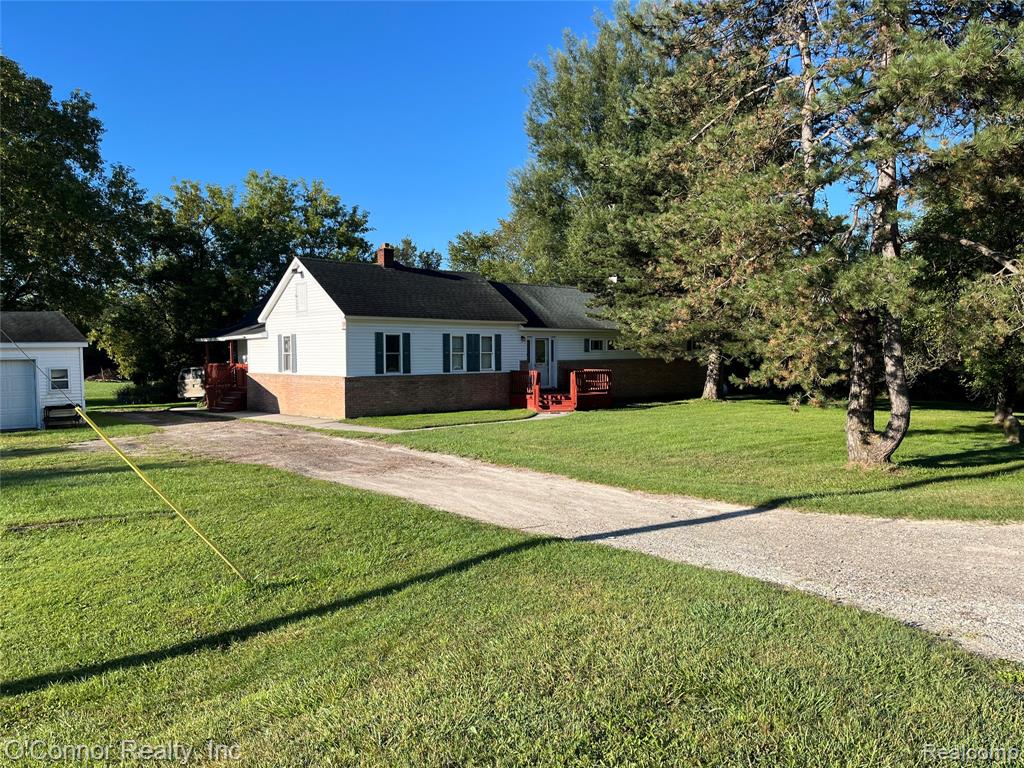 DEER season is just around the corner and here is a GREAT hunting location !!  37+ acres of wooded property and is loaded with deer and other wildlife and pine river runs through the back corner.   The  1700 sqft home offers 3 bedrooms, large living room with wood stove 2 full baths, spacious kitchen and main floor laundry.  Between the wood stove and the wood burning unit in the basement  the furnace barely gets used. Out back is  a large deck , 2 car detached garage, a barn and multiple outbuildings that could have many uses and a  Chicken coop too.      Beautiful trails take you back through the woods   to prime hunting spots.     Bike path in right at the road      If you want country life and be just just minutes to the expressway  this is your spot.