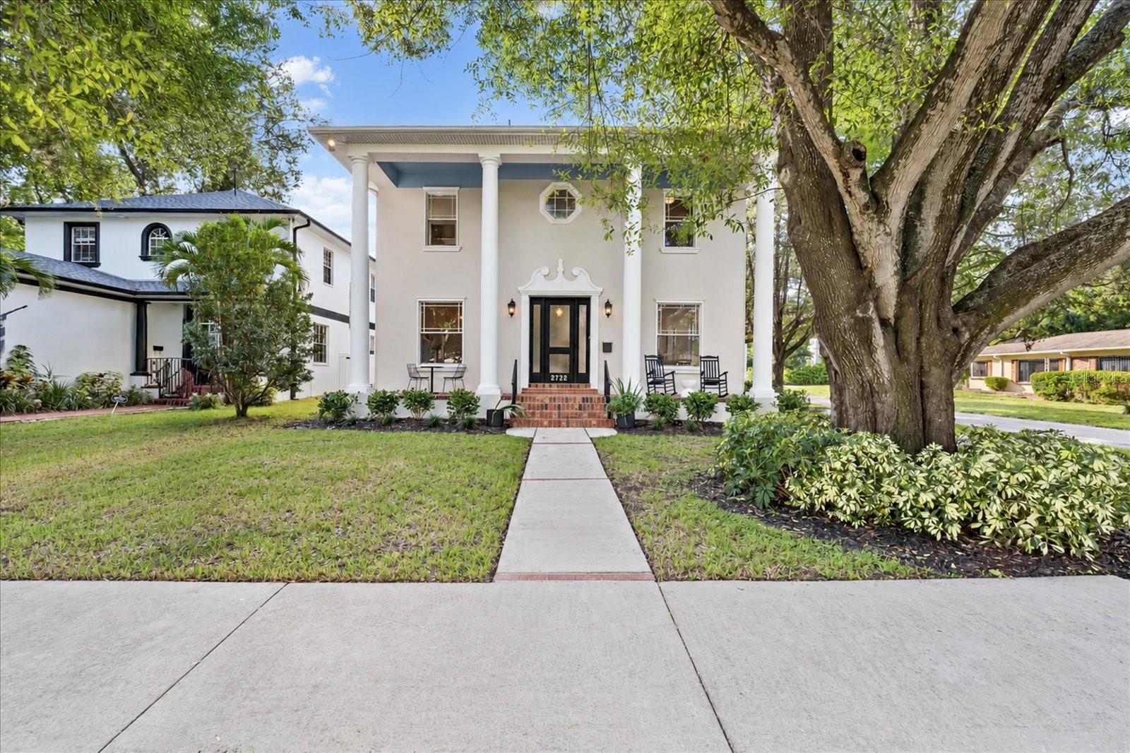 Virtually Staged. Discover elevated LUXURY in the heart of Riverside Heights, one of Tampa’s most established and desirable neighborhoods, just FOUR minutes from Armature Works, Riverwalk, Downtown TAMPA,  the highly anticipated Gasworx district, and the city’s premier dining and entertainment destinations.Beautifully remodeled, this exceptional four-bedroom, three-bath residence offers over 3,000 square feet of thoughtfully curated living space, seamlessly blending timeless architectural character with sophisticated modern design. Hardwood flooring flows throughout, complemented by sleek contemporary finishes, clean lines, and a refined palette that creates an inviting yet luxurious atmosphere.At the heart of the home, the chef-inspired kitchen makes a striking statement with ceiling-height pearl cabinetry, honed quartz countertops, and a custom-designed range hood. Premium appliances include a gas range, drawer microwave, dishwasher, and refrigerator, while a spacious walk-in pantry provides exceptional storage. A charming breakfast nook and expansive countertop bar seating offer versatile spaces for casual mornings and effortless entertaining. Just beyond, a dedicated beverage bar featuring its own sink and wine cooler adds a sophisticated touch for hosting guests.The thoughtfully designed first floor also features a versatile private home office or formal dining room, along with a full bathroom, offering flexibility for modern living, working from home, or accommodating guests. Major improvements include a new roof, new HVAC system, and a beautifully updated laundry room that brings style and functionality to everyday living.Step outside to a private outdoor retreat designed for effortless entertaining and relaxed Florida living. The built-in outdoor kitchen, complete with a premium Napoleon grill, creates the perfect setting for weekend gatherings, alfresco dining, and evenings with friends. Low-maintenance artificial turf delivers a lush, green backdrop year-round without the upkeep of traditional grass, making it ideal for busy lifestyles and providing a pet-friendly space to play and unwind.Completing this exceptional property is a detached two-car garage, offering valuable parking, additional storage, and versatile potential for hobbies, recreational equipment, or a dedicated workshop. Its detached configuration adds to the property’s distinctive appeal while complementing the home’s outdoor living environment.Combining substantial living space, upscale modern finishes, thoughtfully selected improvements, and exceptional proximity to Tampa’s vibrant urban lifestyle, this Riverside Heights residence presents a rare opportunity to experience refined living in one of the city’s sought-after neighborhoods.