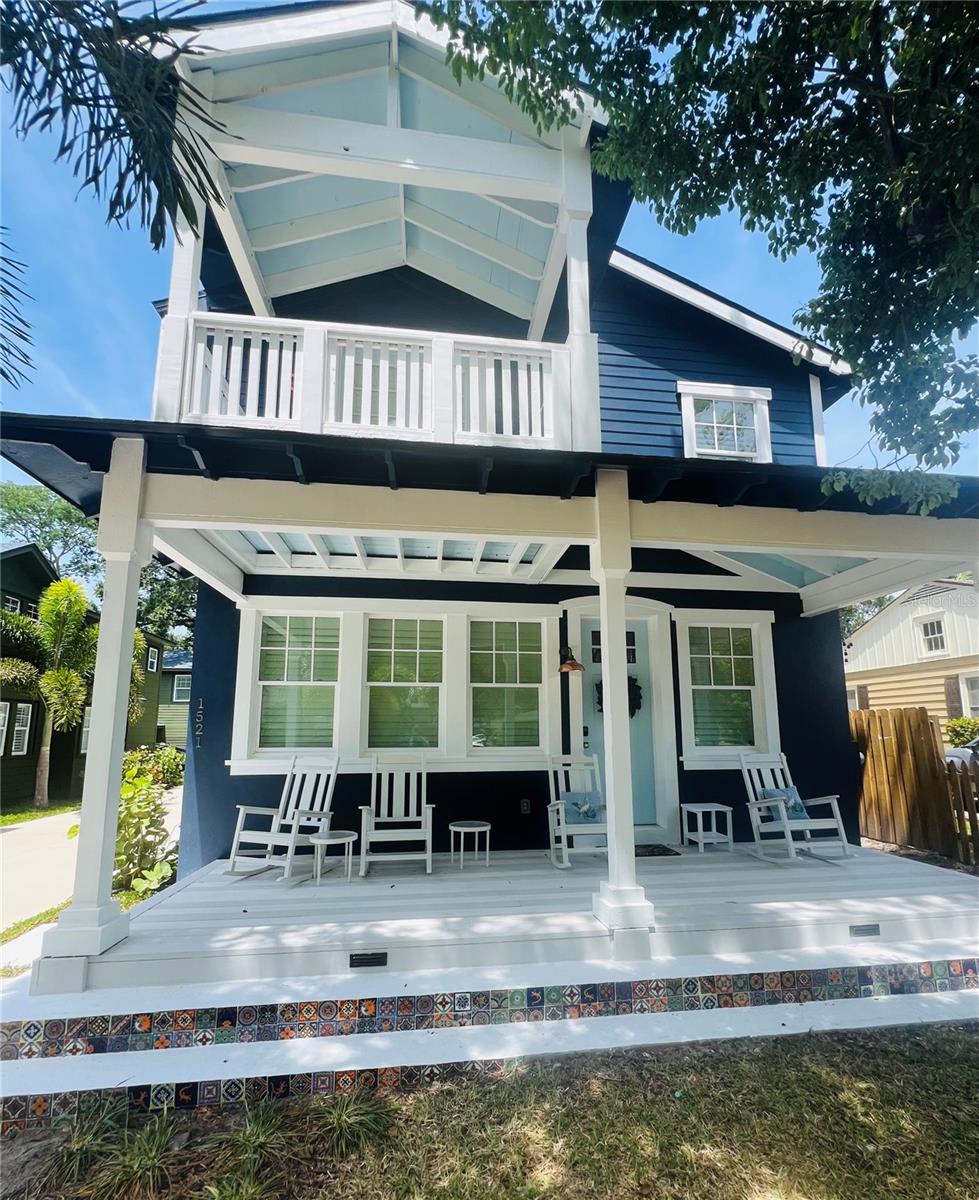 One or more photo(s) has been virtually staged. NEWLY UPDATED INTERIOR & PRICE REDUCTION 

The buyers provided feedback and the seller listened!! Check out the new updated wooden acoustic paneling, freshly hung and painted drywall and stylish wallpaper on the lower level. Over $25k spent.
Nestled in the heart of the charming and historic Eola Heights neighborhood of Orlando, this brand-new Colonial-style residence is a perfect fit among the tree-lined streets and timeless architecture that define the area. At first glance, the classic exterior — complete with a symmetrical façade, shuttered windows, and a broad front porch—blends harmoniously with its distinguished neighbors. But step inside, and you’ll quickly realize: this is no ordinary home.

This modern-industrial 4-bedroom, 3.5-bath residence is a bold and brilliant departure from the traditional. Spanning 3,230 square feet, the home is an industrial-chic masterpiece where artistry meets function at every turn. The innovative use of materials and meticulous craftsmanship, creates a one-of-a-kind interior that stuns and inspires.

From the moment you walk through the door, you’re greeted by custom herringbone hardwood floors that flow effortlessly through the main living spaces, setting the tone for the visual journey ahead. Exposed block, reclaimed wood beams, and raw textures seamlessly intertwine with vaulted 12ft ceilings to create a space that feels both expansive and intimate. The open-concept floor plan is framed by dramatic lines and layers of thoughtfully integrated custom carpentry, from built-in shelving to bespoke trim details that elevate every corner of the home.

The kitchen is an entertainer’s dream and a chef’s playground, outfitted with premium ‘CAFE’ appliances, brushed metal fixtures, and rich cabinetry that complements the home’s industrial aesthetic. A generous island anchors the space, offering ample seating and a seamless transition to the adjacent dining and living areas—ideal for modern living and elegant entertaining.

The primary suite is a true retreat, complete with a spacious his and hers walk-in closets lined in custom millwork and a luxurious spa-like en suite bath with artisanal tile work and high-end finishes. Savor your morning coffee on the private primary suite balcony. Each additional bedroom is uniquely designed, offering flexibility for family, guests, or creative workspaces. The upstairs enjoys abundant natural light and share access to beautifully appointed bathrooms with bold design touches.

Tucked away at the rear of the property, above the detached 2-car garage, is a fully equipped 1-bedroom, 1-bath Accessory Dwelling Unit (ADU)—a perfect option for guests, in-laws, or rental income. The ADU reflects the same commitment to style and quality as the main house, offering privacy and comfort in a compact, well-designed space. Other 1/1 ADU's in the area are renting for between $1500-$1800/month.

From the fine architectural detail to the thoughtfully curated finishes, this home is an extraordinary example of what happens when classic charm meets modern vision. With a location that puts you minutes from Lake Eola Park, Thornton Park, and downtown Orlando’s cultural and dining scenes, this is more than a home—it’s a work of art.

HUGE OPPORTUNITY! This Property appraised for $1,690,000 on 03/13/2025. Don’t miss your chance to gain almost $400,000 in equity and own this eclectic masterpiece in one of Orlando’s most iconic neighborhoods. Schedule your private showing today.