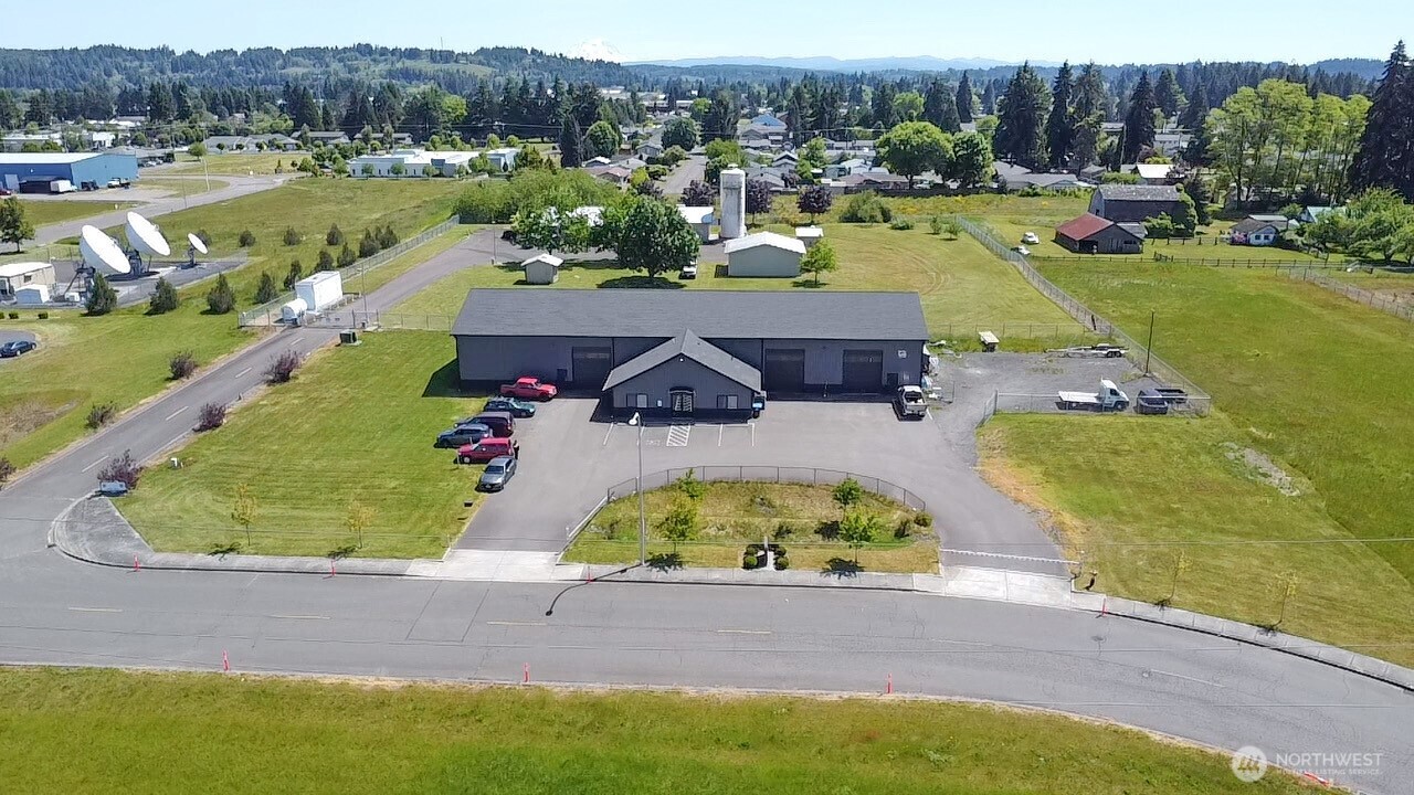 Prime Commercial Property, ideal for business or investment.  8,320 sqft, 1.4 Acres.  Built in 2019, this modern commercial building offers a rare combination of functionality, space and prime location.  Whether you’re looking to expand your operations or invest in a high potential property, this opportunity checks all the boxes.  To include: Three 12x14 ft roll up doors, perfect for shipping, receiving, and equipment access.  3-phase power/600 amps.  Office space and front desk area.  Fenced yard - secured outdoor space for storage or operational use.  Paved parking lot w/plenty of on-site parking. Plus two additional building sites. So don’t miss your chance to own a versatile, move-in-ready commercial asset with room to grow.