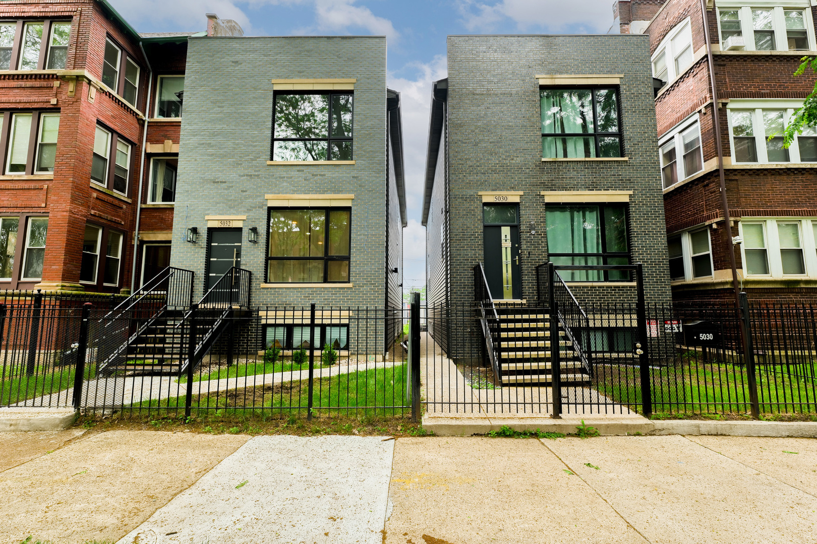 New Construction in Historical Bronzeville Location surrounded by Greystones and new construction. Beautiful open concept five-bedroom, four-bathroom house offers approximately 2,400 square feet of living space. The primary bedroom features a private en-suite bathroom. The additional four bedrooms provide ample space for a variety of living arrangements. The home boasts four full bathrooms, allowing for comfortable and convenient access. With 10-foot ceilings, oak floors, crown moldings, and large window areas floods the home with natural sunlight. With cues from a contemporary aesthetic, the designer kitchen with bright, clean lines, top-quality stainless-steel appliances, an island with waterfall edges and quartz countertops is the perfect place to create your culinary delights. The spacious dining area is perfect for hosting your most intimate dinners or a large gathering of family and friends. Timeless in its design and function, the second level provides a luxurious primary suite with walk-in closets and a spa-like bath with a deep soaking tub, separate shower, double face bowls, and heated floors. Additionally, the second level has two bedrooms with a Jack-N-Jill bath, linen closet, and laundry room with a side-by-side washer & dryer. The lower level with two additional bedrooms, a full bath, and a recreation room with a wet bar, is the perfect spot for entertainment, solitude, home office, or privacy for guests. To complete the package, the expansive yard with a 2-car garage provides relaxation for various outdoor activities. If beauty, quality, and excellence are what you desire, this is the home for you!