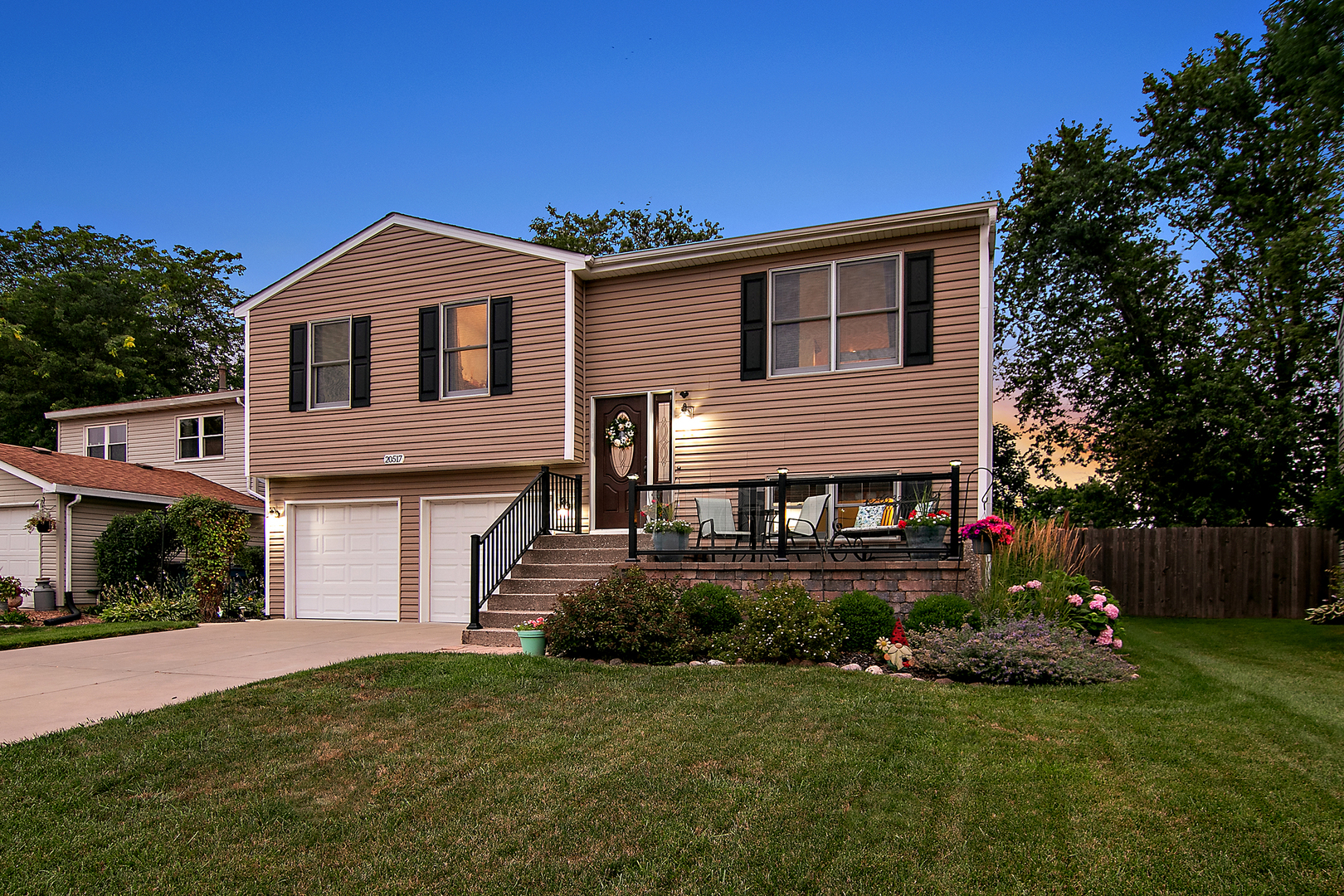 From the moment you arrive, you'll be greeted by a charming brick paver front porch accented with sleek glass railings-setting the tone for the beauty within. This lovingly maintained raised ranch offers the perfect blend of comfort, space, and style, nestled in one of Frankfort's most desirable neighborhoods.    Inside, you'll find 3 spacious bedrooms plus a dedicated office that could easily serve as a 4th bedroom. The heart of the home is the stunning kitchen, featuring custom maple cabinetry, gleaming quartz countertops, rich hardwood floors, and recessed lighting that fills the space with warmth and brightness.    The primary bedroom is a true retreat, complete with hardwood floors, a ceiling fan, and an updated shared bath that exceeds expectations. Enjoy custom cabinetry, a beautiful subway-tile shower, and a luxurious Jacuzzi tub. All bedrooms offer hardwood floors and ceiling fans for year-round comfort.    The lower level adds even more living space, including a cozy family room with a fireplace, a convenient half bath, a large laundry room, and a versatile office space. Step into the inviting 3-season room, perfect for relaxing or entertaining, and follow it out to the show-stopping backyard.    This outdoor oasis includes a paver patio, a charming pergola, a spacious fenced yard, a large shed, and a heated pool-all designed for making lasting memories. The attached garage features a pristine epoxy floor, adding both function and style to your storage and parking needs.    Don't miss your chance to own this truly special home that has been cherished and cared for throughout the years. Schedule your showing today!  Upgrades: Roof 2019, Hot water heater 2024, Kitchen 2014, bathroom 2018, sidin 2016,back patio 2017, front porch, driveway and garage floor 2015
