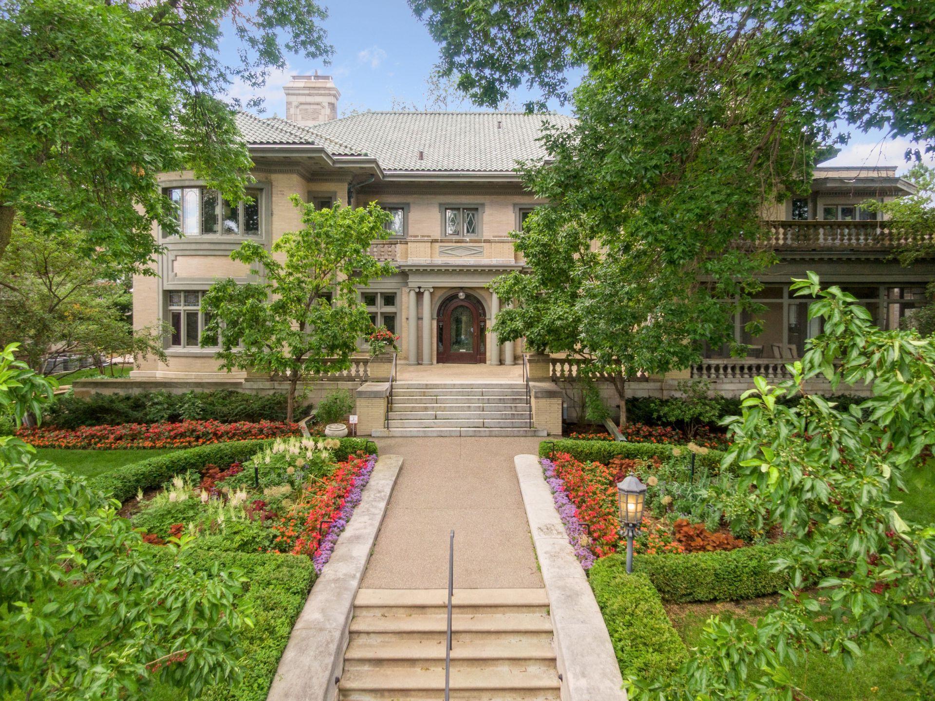 One of the most admired homes on Lake of the Isles. Well known as the ‘Cream of Wheat Mansion’, this home has been lovingly restored and recently updated by John Kraemer & Sons with Twist Interiors. A rare and distinguished residence nestled along one of the most coveted stretches in the Twin Cities. This elegant home seamlessly blends timeless architectural charm with modern luxury, offering panoramic lake views directly across from scenic walking and biking trails. Enjoy gracious living spaces filled with natural light, high ceilings, and refined finishes. Craftsmanship and attention to detail are evident throughout. Each room has been thoughtfully designed for daily comfort and effortless entertaining. The exterior of this home offers extensive landscaping, a private patio, and a meticulously maintained yard. Located just minutes from downtown, Uptown, and the vibrancy of the Chain of Lakes, this home offers unmatched access to the best of Minneapolis.