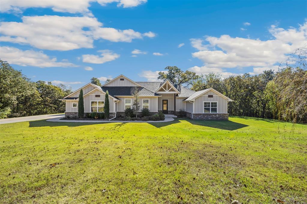 LARGE LOT, on 2.5 acres this fantastic house has 4 bedrooms, 2 bathrooms. There is a spacious 3-car garage and a large beautiful lot with plenty of space for everything you love. Step inside and you'll find an open layout that connects the living areas, kitchen, and bonus room. The kitchen is decked out with shiny stainless-steel appliances that are perfect for cooking up delicious meals. There's also a big island that's great for preparing food and hanging out. The primary bedroom is a perfect retreat, with its own bathroom featuring dual vanities and a separate shower. Three more bedrooms mean there's room for family or friends to stay. The garage has tons of room to fit your cars and other belongings. Don't forget about the giant yard. Whether you want to plant a garden or have a barbecue, there's plenty of space to do it all. This is a golden opportunity to own a luxurious home with all the things you've been dreaming of. Buyer to verify property taxes and schools. *Listing Agent Broker/Owner.