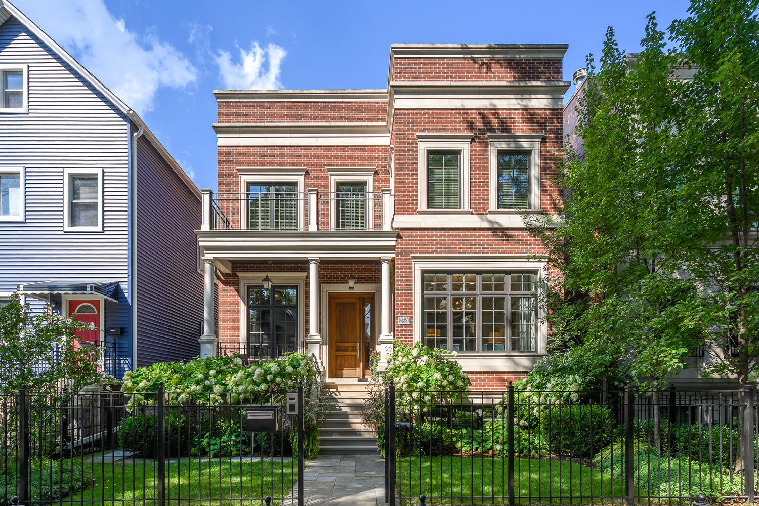 Enjoy living on an extra wide, 40' lot on this beautiful Lincoln Park tree lined block. This newer construction custom home feels very current and well as totally timeless. An inviting front porch is the perfect place to relax and also welcomes you into this classically designed space. The width can be felt immediately and allows for grand room sizes and perfect spaces for entertaining as well as every day, comfortable living. A sunny front living room overlooks Magnolia through a huge east-facing window. The living room flows perfectly into the gracious dining room, and there is a perfectly appointed home office or library with a built-in desk. A classic white kitchen is grand in size and features an oversized island, double ovens, full size refrigerator and freezer, as well as a butler's pantry that flows seamlessly from the dining room. An adjacent breakfast area is the perfect casual eat-in space, with views onto the amazing outdoor space. Completely open to the kitchen and breakfast area is the amazing great room with beautifully detailed coffered ceilings and a fireplace. The spaces together create the perfect hangout rooms that live for today. A coveted mudroom is located at the back of the home, featuring built-in benches, heated flooring, as well as a hidden built-in vacuum. This space offers direct access to the kitchen greatroom and is right where you'll need it! The second level of the home features a rare four bedrooms up, all generously sized, all with private ensuite baths. The primary suite offers the most incredible closet space and a luxurious bath with a separate tub and shower, dual sinks, and fantastic storage. A true walk-in laundry room completes the bedroom level. The third level is devoted entirely to the backyard in the sky! Spanning the length of the home with two "grassy" turf areas, as well as a deck and pergola. A true oasis! The lower level has sensational ceiling height and offers a massive recreational/media room, wet bar, two additional bedrooms and baths, plus a huge storage room and second laundry center, making a very comfortable space for guests. Featuring direct access off the kitchen and mudroom, a stone patio leads to the perfectly secluded deck over the four-car garage! Sellers customized this space after purchasing and did not spare any expense. Complete with Ipe decking, pergola, gorgeous landscaping, an outdoor kitchen and fire pit, this space feels like an addition to the home and living space. This is a fabulous Lincoln Park locale, with restaurants and coffee shops steps away, as well as multiple parks.
