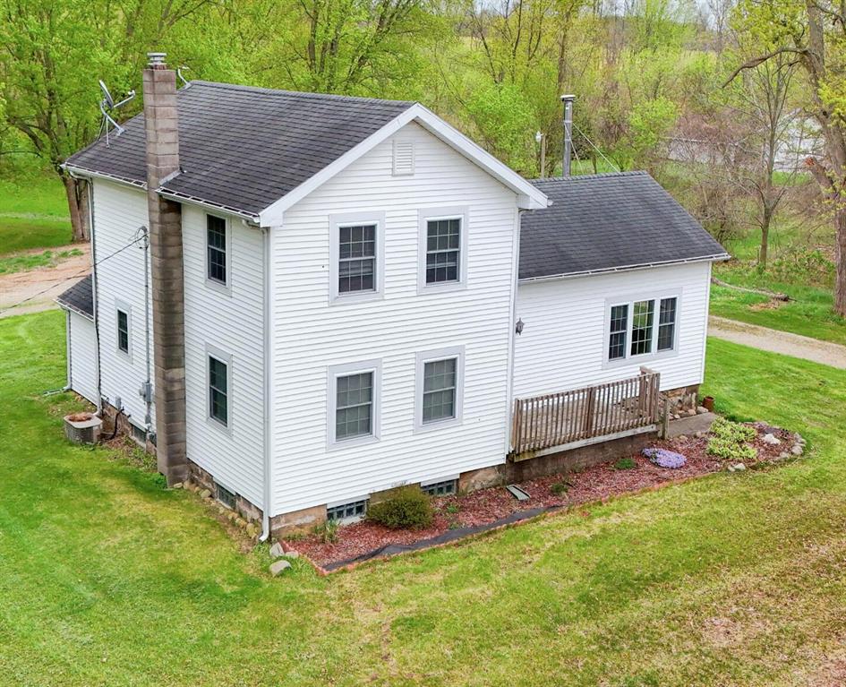 This charming and immaculate home offers the perfect blend of country living and convenient location. 3-bedroom, 2-bath sitting on 2.73 acres and features hardwood floors throughout, creating a warm and inviting feel.The interior offers a bright, open layout with plenty of natural light and the added convenience of first-floor laundry. The kitchen provides ample cabinet space and functionality for everyday living. Enjoy outdoor living with a large back deck ideal for entertaining, along with a smaller front deck perfect for relaxing. The property also includes a spacious 60x30 pole barn with a recently treated roof, offering excellent storage, workshop, stalls for horses, and a loft. Ideally located just minutes from I-94 and US-127, approximately one mile from Baldwin Park, and centrally positioned between Jackson and Lansing. This property offers the space and versatility of country living while remaining close to local amenities.