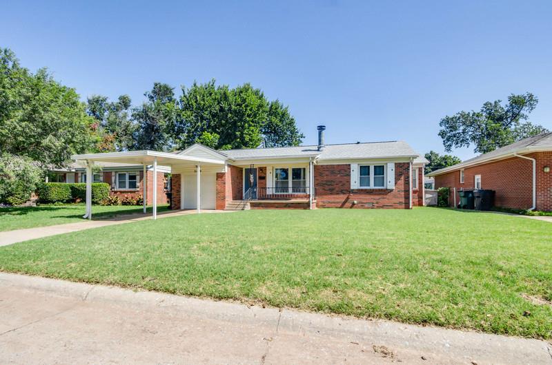 Welcome to Mayfair Heights! This home has the major mechanical updates completed and is ready for it's next owner to add their personal touch. Entering from a front porch made for sitting, the main living area is spacious, features a wood burning fireplace with stone surround and hearth, built in shelves/cabinets and decorative ceiling beams. The kitchen is small but mighty with GE Plus 6 burner range, Bosch dishwasher and plenty of cabinets. Every room has multiple windows for a bright, naturally lit atmosphere. Heater, AC and water heater have been replaced in the last three years . Situated on a large interior lot, this cute little brick home with single car garage includes a carport and windowed workshop with loft for additional storage. Easy access to NW Expressway and Lake Hefner Parkway as well as major retail and dining options. Superbly maintained and well loved, this home is a must see!