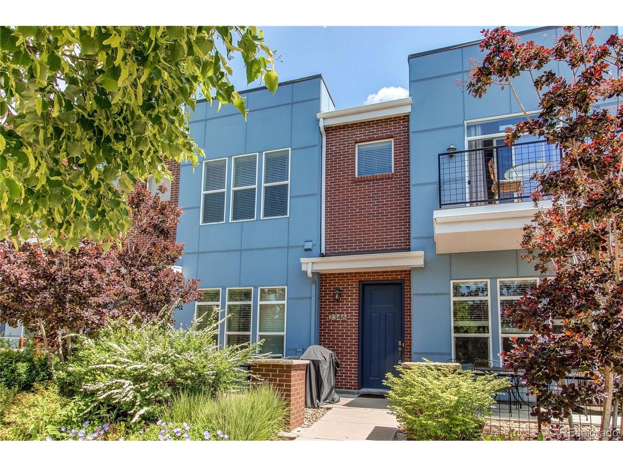 Stunning town home in Central Park.  New interior paint throughout.  2 story delight with 2 car garage attached.  9' ceilings throughout.  Hardwood flooring on main floor.  Great concrete front patio all nicely landscaped by the HOA.  Living room with gas fireplace.  Large kitchen with all stainless appliances, granite countertops and pantry.  1/2 bath.  Upstairs you will find the primary suite with it's own balcony.  Walk in closet, huge tub and separate walk in glass shower plus double sinks.  Two other bedrooms and full bath.  Upstairs laundry with Washer and Dryer included.  Tall 2 panel doors throughout.  The 2 car garage in all dry walled and insulated.  Ready for quick move in.  Close to everything including Stanley Marketplace, parks, trails, off leash dog park, restaurants, Starbucks, light rail and fantastic schools.  Close to I-70 and I-225.  Come check out this opportunity at this price.  1560 sf.
