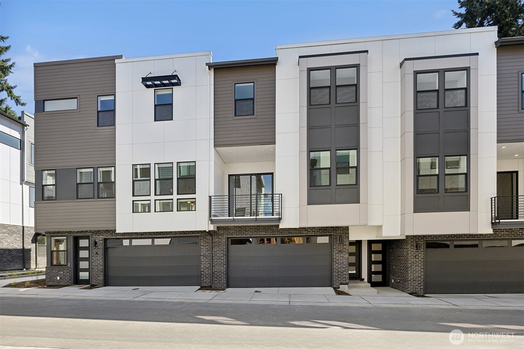 Welcome to Arborstone—where boutique townhome living meets the heart of Bothell! This thoughtfully designed community offers a prime walkable location near shopping, dining, parks, and more. A home so bright, you have to wear shades! Unit 14 is the ideal place to call home, featuring a flexible lower-level den or office with an attached powder room, a spacious open-concept main floor with soaring 10-foot ceilings, and abundant natural light throughout. The chef’s kitchen impresses with double-stacked cabinets and sleek designer finishes. Included integrated smart home tech and a two-bay garage with EV charging. Don’t miss your chance to live beautifully at Arborstone. *Broker must accompany buyer on first visit. Site registration policy #4675. Call to schedule your tour!