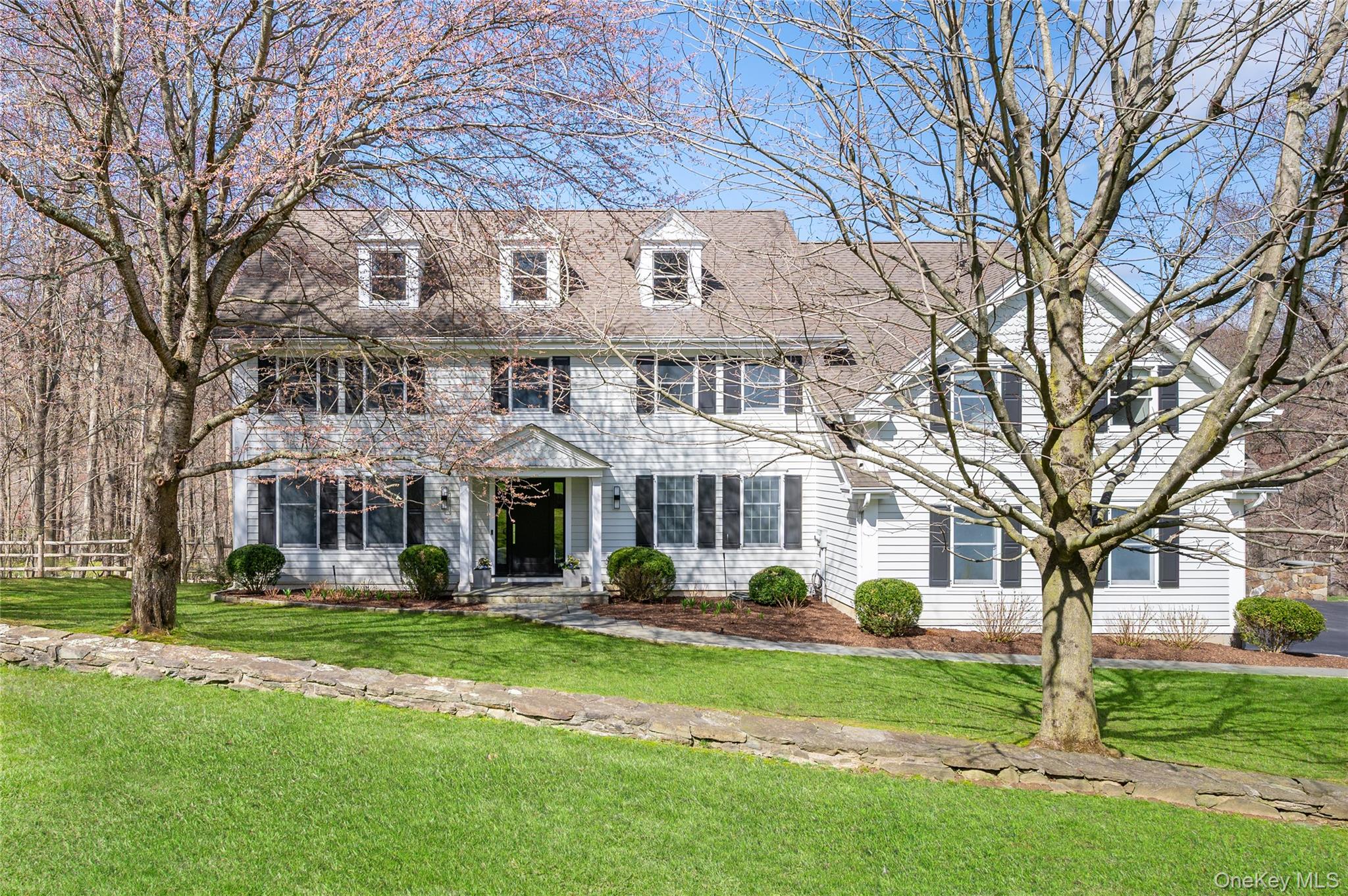 Set on two expansive acres at the end of a sought-after cul-de-sac, this sophisticated and chic Colonial has been thoughtfully renovated with impeccable style and attention to detail. Designed for effortless everyday living and elegant entertaining, the home offers a seamless open flow, sun-filled interiors, and beautifully curated finishes throughout. At the heart of the home, a fabulous chef’s kitchen blends style and function with generous space for cooking, gathering, and entertaining. The luxurious primary suite features a spa-inspired bath that evokes a five-star experience. Wine enthusiasts will appreciate the stunning glass-enclosed wine room, while the dedicated gym provides ample space for all your fitness equipment. The finished lower level also includes a spacious family room and full bath. A rare opportunity to enjoy modern comfort, timeless design, and exceptional privacy in a coveted cul-de-sac setting. This home offers the complete package: an exceptional home, prime location, and top-rated Byram Hills School District all in one.