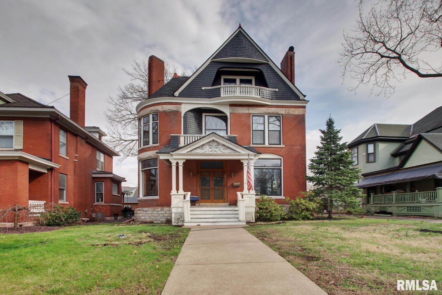 Stunning 1890 historic home offering 2,900+ sq ft of timeless character and thoughtful updates. This 4-5 bedroom, 1.5 bath beauty features rich original woodwork, stained glass, tall ceilings, oversized rooms, abundant natural light, and striking architectural detail throughout. Updated kitchen and baths blend beautifully with the home’s vintage charm, while the flexible layout offers space for living, working, or hosting. Enjoy a spacious yard, brick patio, unfinished attic and basement for storage or future possibilities, plus a detached 2-car garage. A rare opportunity to own one of Quincy’s standout historic homes.