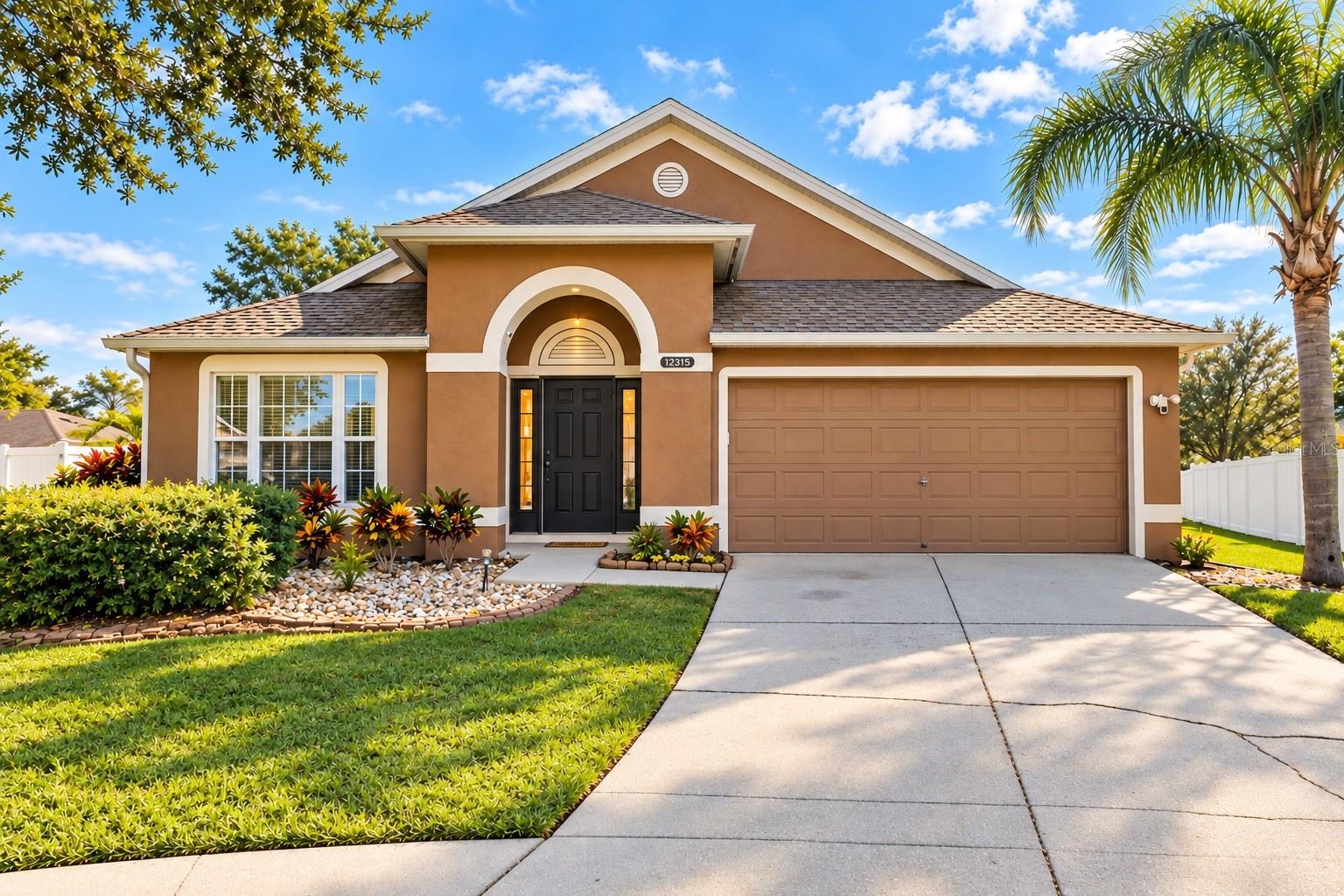 Welcome home to this spacious 4-bedroom, 2-bathroom residence nestled on an oversized lot in a desirable cul-de-sac in the sought-after South Pointe community of Riverview! Thoughtfully designed for comfortable everyday living and entertaining, the inviting kitchen flows seamlessly into the main living area, creating the perfect setting for gathering with family and friends. The generously sized primary suite features beautiful vaulted ceilings and double doors leading into an expansive en-suite bathroom, creating a relaxing private retreat. The versatile floor plan offers plenty of possibilities, including space for a formal sitting room, dining area, or home office to fit your lifestyle. Just off the living room, step into the expansive screened-in porch, offering an extension of your living space and the perfect spot for morning coffee, relaxing evenings, or entertaining while overlooking the oversized backyard. Outside, the generous backyard offers endless possibilities for outdoor gatherings, gardening, or creating your dream backyard oasis. The oversized lot and cul-de-sac setting provide added space and privacy to enjoy the Florida lifestyle. Located in the established South Pointe community, residents can enjoy neighborhood amenities including a community swimming pool, playground, park areas, and dog park. Beyond the neighborhood, Riverview offers a wonderful blend of suburban charm and everyday convenience, with nearby shopping, restaurants, recreational parks, and outdoor activities. Enjoy easy access to US-301, I-75, and the Selmon Expressway, connecting you to Downtown Tampa, Brandon, Tampa Bay's beautiful beaches, and surrounding destinations. With its generous lot, flexible living spaces, expansive screened porch, community amenities, and convenient location, this home offers a wonderful opportunity to enjoy everything Riverview has to offer!