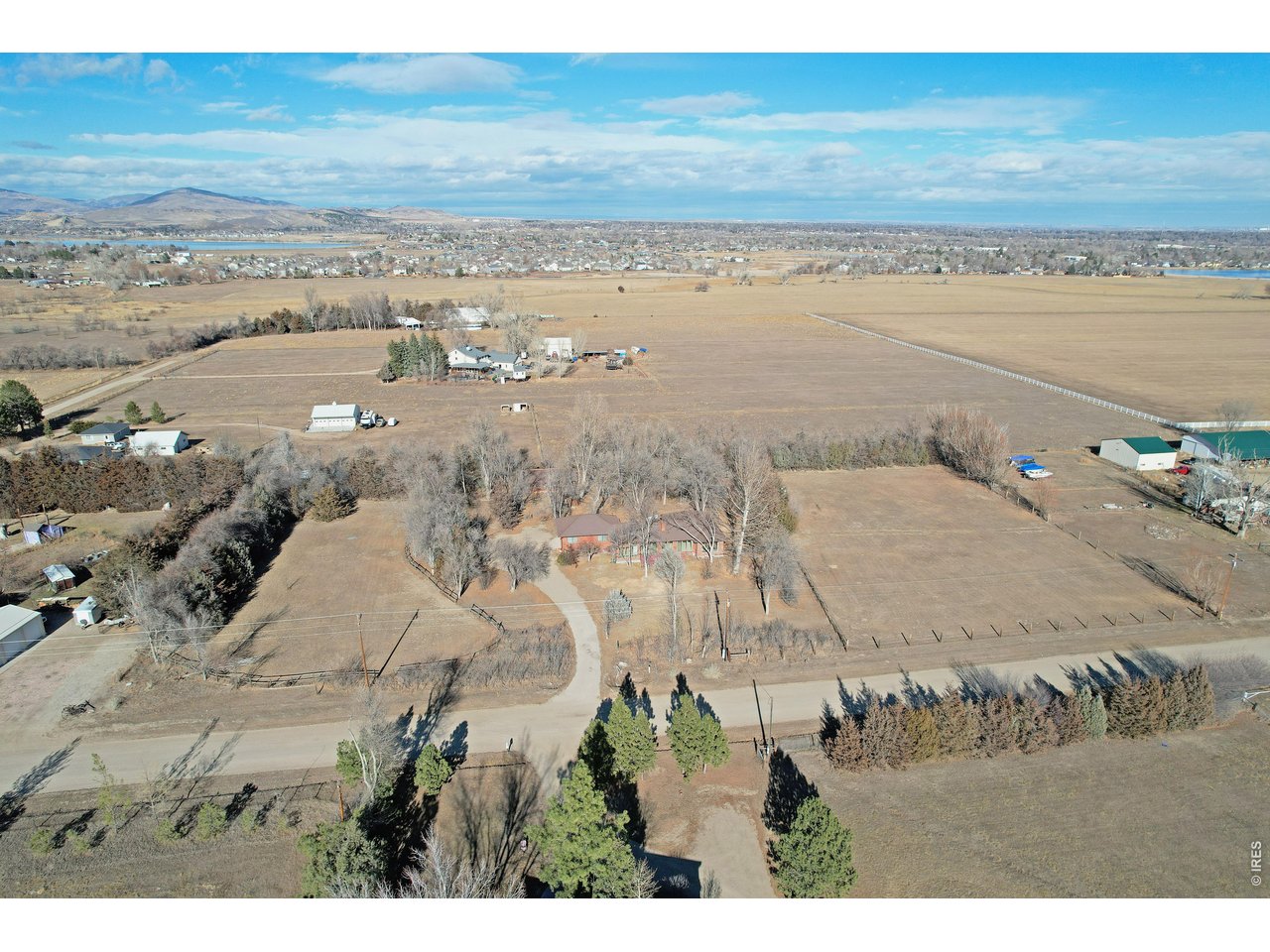 Any offers need to be in April 14th by Noon please! THIS IS ONE SPECIAL PROPERTY! Tucked in-between the Rocky Mountains and the city of Loveland, you will love coming home to this quiet cul-de-sac community on Wild Bird Dr. Peaceful rural living but close enough to all the places you need to get to! 3.5 acres with 2 large pastures on either side of the home, horse barn, enough land to visualize any dream you have! Garage is oversized and heated. BRAND NEW SEPTIC system and NEW ROOF just installed! Home has over 1800 square feet all on one floor and has the BEST NATURAL LIGHT I've ever seen, huge windows and glass doors facing south open onto a deck to enjoy the Colorado sunshine and mountain range. Radiant floor heat throughout, great easy living with open floor plan, tall ceilings, large living area with wood burning stove. Interior walls and floors were just painted. 1 SHARE OF SOUTH SIDE IRRIGATION & RESERVOIR CO WATER will be included with acceptable offer. All information provided is deemed reliable but not guaranteed. Buyer and Buyer's agent are responsible to verify square footage, taxes, schools, zoning, to verify livestock code from Larimer County, and to verify water right info, etc.