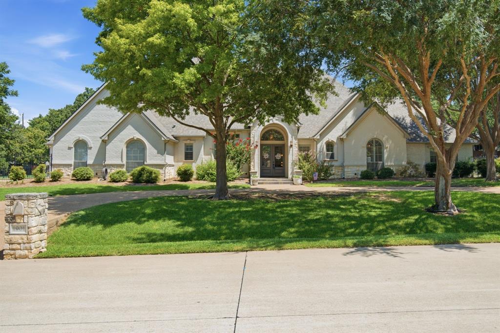 Open Houses July 25th 11 to 1 and July 26th 1 to 3. Welcome to a truly exceptional home where luxury, comfort, and thoughtful design come together. Nestled on a beautifully landscaped .9-acre lot in an exclusive gated community with mature trees, this rare property offers the perfect blend of elegance, privacy, and everyday convenience.Boasting an ideal floor plan, this stunning home features 5 spacious bedrooms, with 4 conveniently located on the first floor, making it perfect for families, guests, or multi-generational living. The beautifully updated white and gray chef's kitchen is the heart of the home and showcases premium Thermador appliances, abundant cabinetry, generous counter space, and stylish finishes that will impress any home chef.The open-concept design is filled with natural light and features soaring ceilings, hand-scraped hardwood floors, plantation shutters, oversized closets, and spacious living and dining areas that are perfect for entertaining or relaxing with family.Step outside into your own private backyard retreat featuring an updated diving pool with a tanning ledge, creating the perfect setting for summer gatherings or peaceful evenings at home. The expansive backyard offers endless possibilities for recreation, gardening, or simply enjoying the beauty of the surrounding landscape.Exceptional curb appeal begins with a circular driveway and continues with a separate gated driveway leading to the spacious 3-car garage, providing both convenience and added privacy.Located in the highly acclaimed Keller ISD, this home offers easy access to premier shopping, dining, entertainment, major highways, medical facilities, and hospitals, making daily life both convenient and enjoyable.