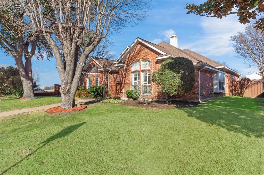 Beautiful former model home designed to impress from the very beginning w the most desirable layout. Soaring ceilings create an immediate sense of openness the moment you step inside, while sunlight filters gently through elegant plantation shutters, casting warmth across the living spaces. Wood-paneled accent walls add character and depth, giving the home a refined yet welcoming personality.The most desirable floor plans for a growing family. A flexible room easily becomes a home office, fitness studio, or creative space — adapting beautifully as your family’s needs evolve. Texas-size KIT & family flow seamlessly together. Four bedrooms & three full baths provide both privacy & practicality. The grand primary suite is a true private retreat, generously sized and thoughtfully designed for relaxation. The spa-inspired primary bath features a jacuzzi soaking tub — the perfect place to unwind at the end of the day — along with separate vanities, a walk-in shower, and abundant space to start and end each day in comfort. Additional bedrooms are generously sized, ready to grow alongside your family’s milestones.A tranquil koi pond brings a sense of calm, while the extra yard space invites weekend barbecues, children’s playtime, or simply enjoying a quiet Texas sunset. Covered parking adds convenience, but it’s the feeling of serenity that truly sets this outdoor space apart.Walking distance to a beautiful park with a lake, jogging trails, & playground becomes an extension of your backyard. Morning walks, evening bike rides, and weekend picnics become part of daily life. With quick access to major highways, commuting is simple — yet when you’re home, it feels peacefully removed from the rush.Well priced for its size, upgrades, prime location, and PISD schools, this nearly 2,977sqft residence offers more than space — it offers ease. It offers comfort. It’s a place where a family can truly live, grow, and feel at home.