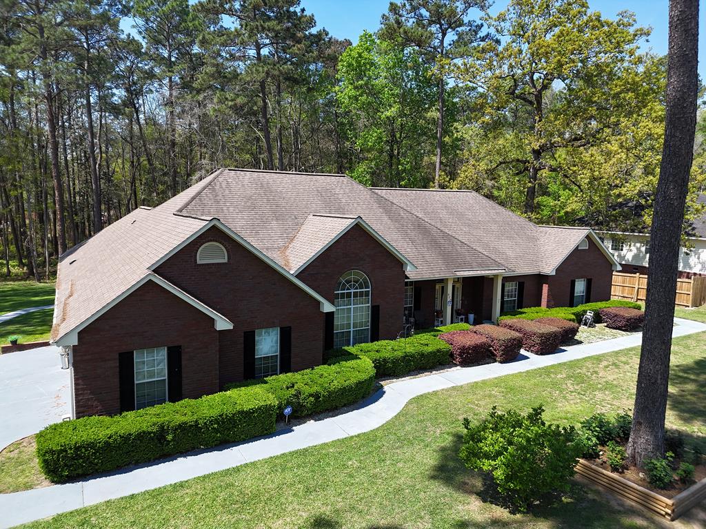 A must see! This 4 Bedroom 3 bath brick home on 1 acre lot  minutes away from restaurants, shopping and schools. This home has formal dining room. Great room  with a fireplace. Kitchen has beautiful granite countertops and lots of storage. Beautiful sunroom that allows you to enjoy nature, as well as the wonderful back deck. Click here for virtual tour https://my.matterport.com/show/?m=Eyz2tnGMW96&mls=1