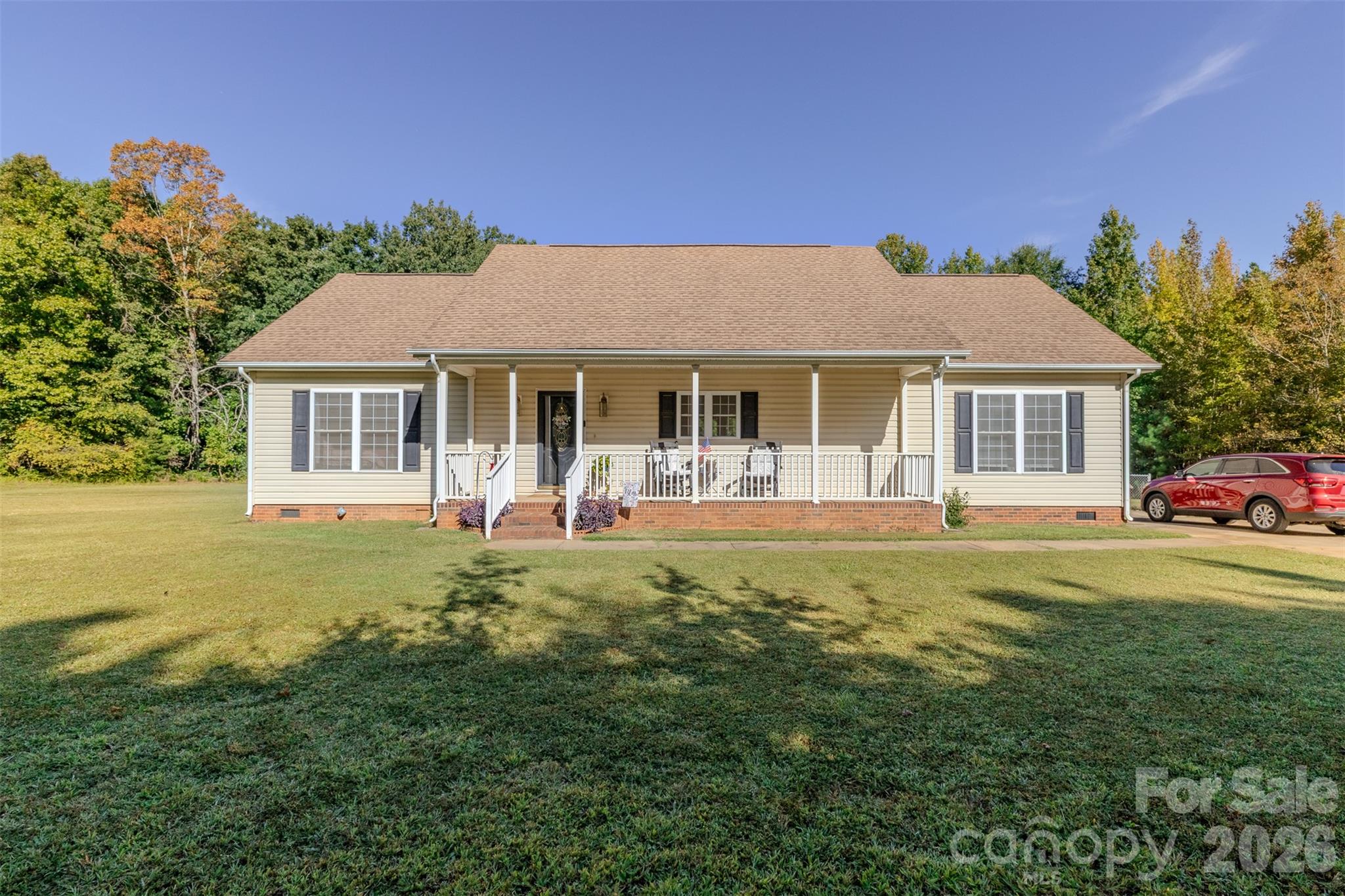 Built in 2005, this 3-bedroom, 2-bath home offers approximately 1,700 sq. ft. of comfortable living space. The open floor plan creates an easy flow between the main living areas, while the primary suite features a spacious bathroom with a Jacuzzi tub and walk-in closet. Situated on just over 2 acres, this property offers plenty of privacy and room to spread out, garden, or simply enjoy the outdoors. The fenced backyard provides a great space for pets, play, or relaxing at home. Enjoy the breathing room of a private setting while still being convenient to Kings Mountain and surrounding areas. A great opportunity for buyers looking for acreage, privacy, and NO CITY TAXES!