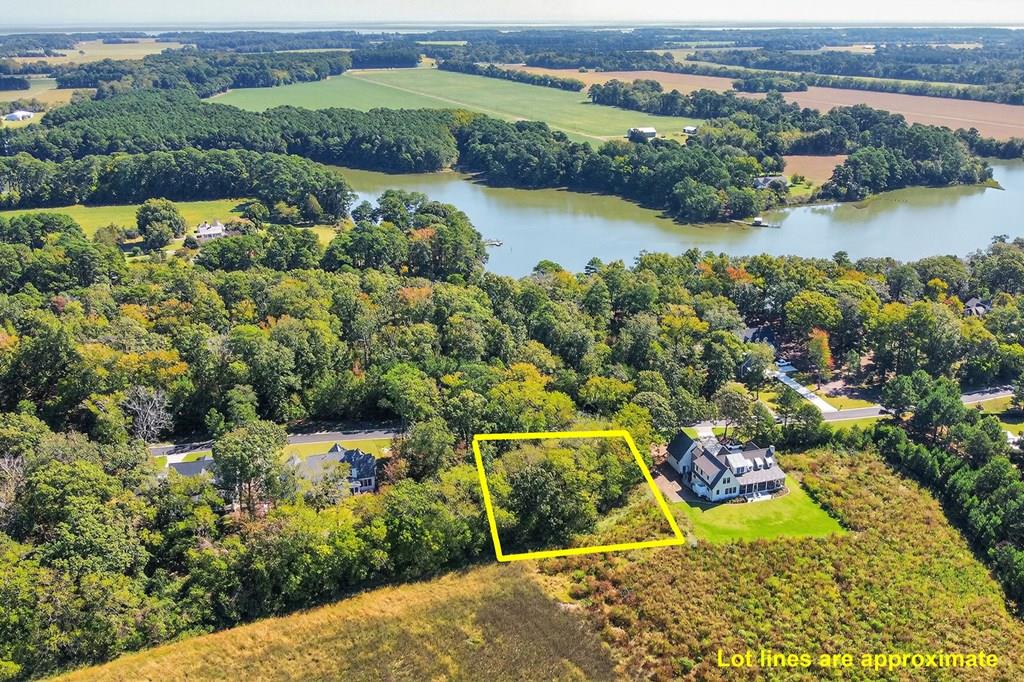 Welcome to the Plantation Pointe Section of Bay Creek, where a nearly half-acre homesite awaits you, offering the perfect canvas to build your dream home. Plus, this homesite backs up to a protective Preserve! Embrace a coastal lifestyle with access to Bay Creek's premier community amenities, including 27 holes of championship golf, pickleball courts, an on-site restaurant, a life center, and a two-mile private beach. The Historic Cape Charles district is just a short golf-cart ride away, with access to boutique shops and restaurants. With no rush to start building, you have the opportunity to explore the available Builders Guild and ARC information at your leisure.