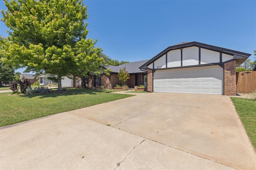 Beautifully Updated 4-Bedroom 2.5 Bath Gem with Timeless Charm.
This move-in-ready home blends modern upgrades with classic character. Enjoy wood-look tile throughout the main living areas, ScottGuard carpet in bedrooms, and original brick floors in the kitchen and laundry. Recent improvements include a black roof with gutter guards, fresh exterior paint, and a cedar fence (2022). The hybrid fireplace with German schmeer brick adds warmth and style. Relax on the spacious covered patio or front porch, surrounded by fresh landscaping. Conveniently located near shopping, dining, and the Kilpatrick Turnpike. Schedule your showing today!