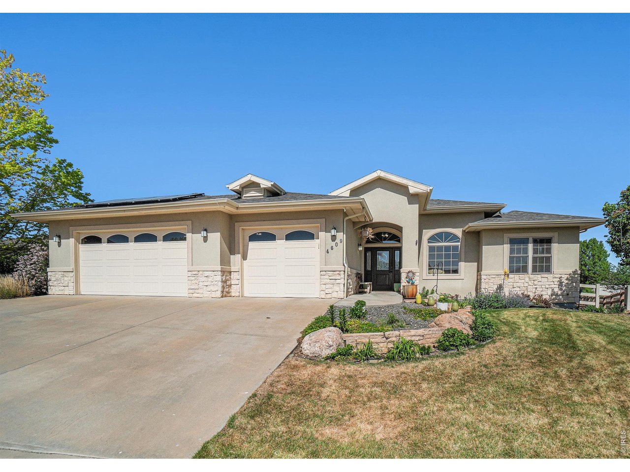 This stunning custom built ranch home in highly sought after Fossil Ridge in Windsor is designed for comfort, flexibility and modern Colorado living. Perfectly positioned near premier golf, future entertainment and easy commuter access this home offers a rare combination of luxury and functionality. Step inside to discover thoughtfully designed floor plan with two primary suites ideal for multi general living or guests. The main primary retreat features a remodeled bathroom with a large walk in shower and walk in closet. An additional primary in the lower level along with a 5 piece bathroom including a jetted tub. The expansive basement offers incredible versatility with abundant storage, custom built with a shaft already prepared for a future elevator offering long term accessibility and convenience. High end touches throughout including durable epoxy coated garage floors, three car garage, fully owned solar system for energy efficiency and lowered utility costs. Step outside to the private backyard oasis featuring a sunken patio, deck with retractable awning, perfect for entertaining and relaxing. Location is everything, close to championship golf at Highland Meadows Golf Course and Raindance National Golf Course. Convenient access to I 25 for an easy commute Best of all NO METRO!!