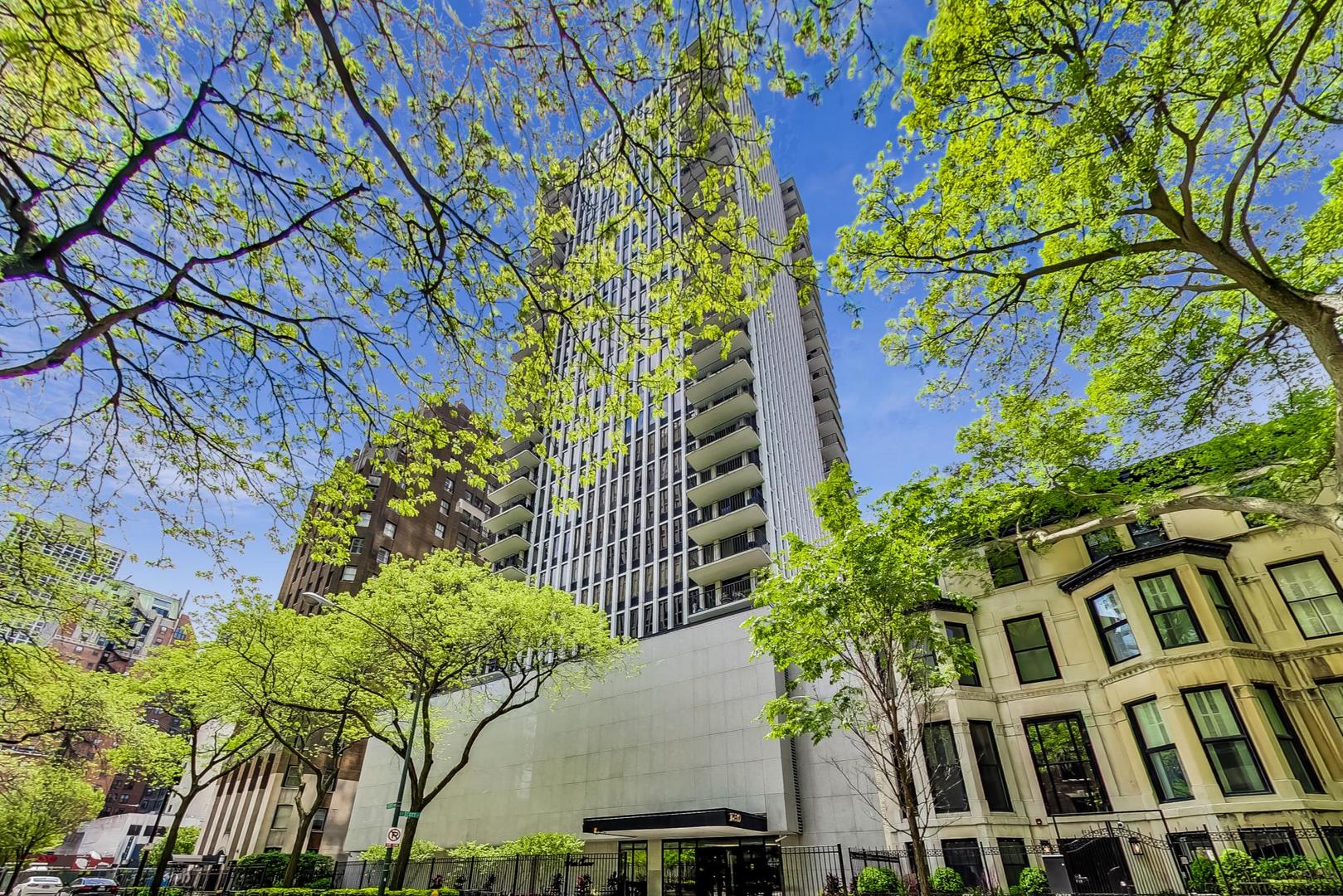 Completely redone with bespoke finishes, this oversized corner 2 bed, 2 bath is perfection. Located in the heart of the Gold Coast, this corner unit has the coveted open floor plan & is flooded with light from floor-to-ceiling windows offering idyllic views.  Enjoy cooking & entertaining from the large custom kitchen w/oversized breakfast bar, stone countertops & backsplash, stainless steel appliances, shaker cabinets, & storage galore.  The generous floor plan allows for a real dining table & plenty of living space plus a wonderful balcony - perfect for grilling or just relaxing.  In the living room, the custom built-in offers more storage plus a hidden desk.  Before heading to the bedrooms, don't miss the dry bar w/drink fridge & marble backsplash!  The primary suite is a private oasis w/a gorgeous marble & porcelain bath with dual sinks, walk in shower, organized closet, decorative millwork & a fabulous built-in that more than doubles the closet space.  The second bedroom also has generous organized closets. The hall bath is also perfectly redone with marble & porcelain.  Throughout the condo, you will find hardwood floors, custom window treatments & shades, brand new doors, organized closets & new lights w/dimmers.  No detail was overlooked during this gut rehab.   Large private storage room on 8th floor - easy access!  Building features include: 24 hour door staff, onsite gym, party room and incredible rooftop deck. A+ location being just steps to fantastic shopping and restaurants, public transportation and Lake Michigan.  One deeded parking spot on the 2nd floor available for 50K.
