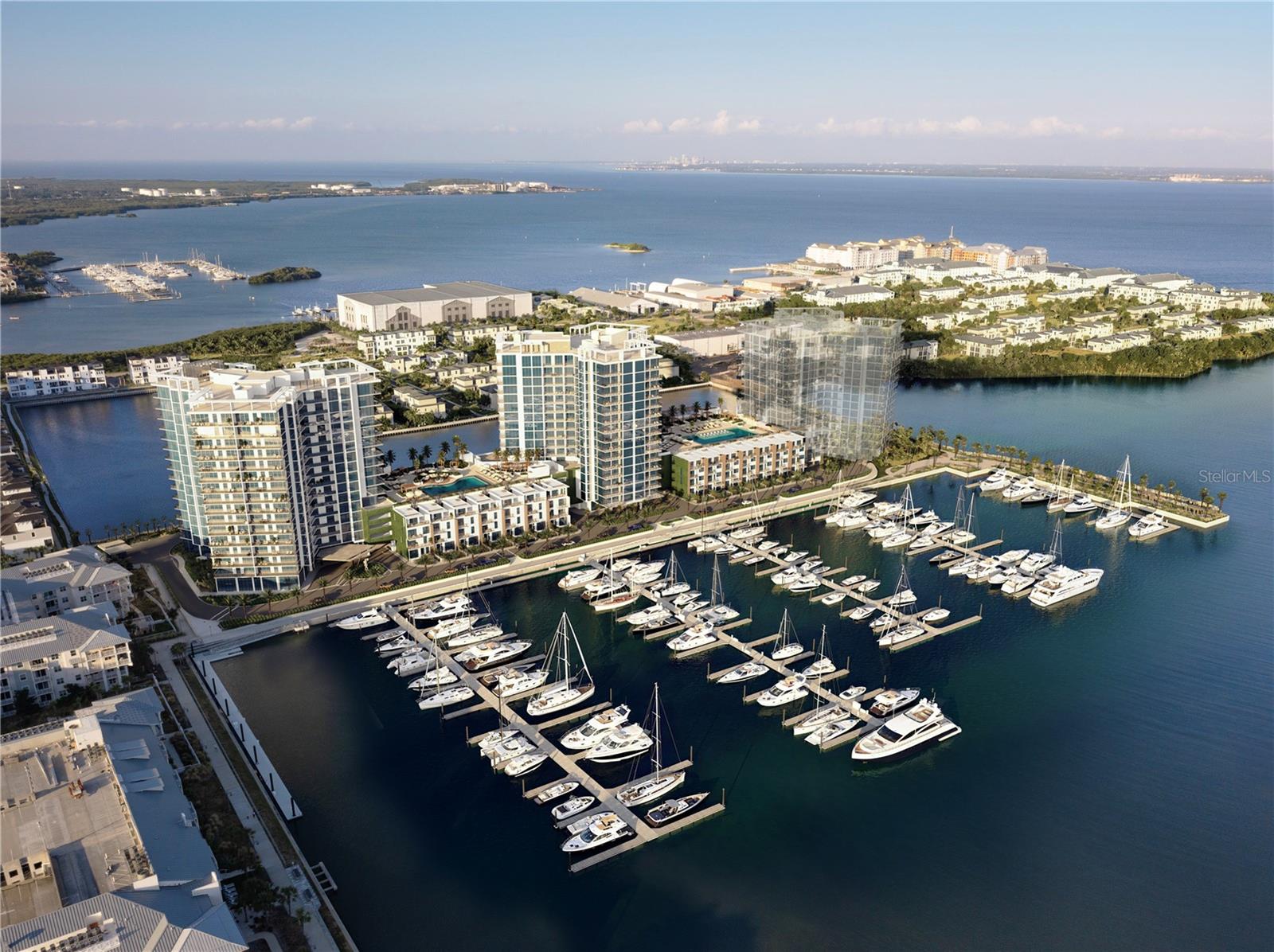 One or more photo(s) has been virtually staged. Pre-Construction. To be built. Marina Pointe. Enjoy elevated Gulf Coast living at its finest with two new waterfront towers to complete this iconic trio of 383 thoughtfully designed condominiums and 14 Harbour Homes, all with exceptional resort-style amenities. On a peninsula on old Tampa Bay with 1.5 scenic miles of walkable bayfront promenades, a private, deepwater marina, and just minutes from downtown Tampa and St. Pete, this all-new, 52-acre destination at the Westshore Marina District in South Tampa awaits. Preconstruction pricing is due to finish soon. Tower Two construction to begin in 2026 with move-in expected Q2 of 2028. Marseille floorplan: A seaside city in the south of France, Marseille is said to be the meeting place of style and history, dating back to 600BC. This 2-bed / 2 ½-bath open floorplan with over 1,600 square feet illustrates the timelessness of exceptional design that blends with nature to create an exquisite lifestyle of fresh air, stunning vistas and extraordinary modern convenience. Whether enjoyed as a primary or vacation home, life is enjoyed when you wake up to frolicking dolphins in the bay. This contemporary flow-through floor plan offers expansive open living areas. Floor-to-ceiling glass walls and windows provide breathtaking views of an endless horizon. In the words of a Marina Pointe resident “TVs are optional with views like these.” Oriented to maximize panoramic water and city views, each elegant waterfront condominium tower, penthouse and town home residence is a showcase of modern European living, innovative design and premium features, rendered in thoughtful detail and exquisite finishes. Gourmet kitchens feature European-style cabinetry, Jenn-Air appliances and gracious social areas for entertaining. Owner’s suites double as spa-like retreats with generously sized walk-in showers, premium fixtures and designer-ready walk-in closets.
