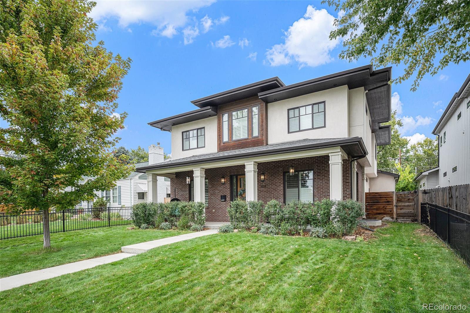 **Indoor photos coming Thu. 6/11**Perfectly positioned in Denver’s highly coveted Cory-Merrill neighborhood, this stunning 2016 brick estate blends timeless architectural craftsmanship with sophisticated modern luxury. Designed for effortless indoor-outdoor living and entertaining, the home welcomes you with an expansive open-concept floor plan illuminated by a wall of windows and grounded by gorgeous dark wide-plank hardwood floors.At the heart of the home is a spectacular chef’s kitchen, featuring a massive central island, premium finishes, a sunlit breakfast nook, and a walk-in pantry. A dedicated butler’s pantry with a wet bar and wine refrigerator seamlessly connects the kitchen to the formal dining room, while a private home office offers a quiet sanctuary for remote work. The generous great room anchored by a custom fireplace serves as the ultimate gathering space, framing views of the private outdoor space.Upstairs, the luxury primary retreat acts as a private oasis, featuring a spa-inspired primary suite, an expansive custom walk-in closet, and a convenient morning coffee bar just outside the door. Two additional upstairs bedrooms feature private en-suite baths, alongside a dedicated upper-level laundry room.The fully finished basement expands the home's versatility, offering a massive recreation room equipped with a premium surround-sound media center, perfect for game days or movie nights. This lower level also includes two flexible bedrooms, ideal for a private gym, guest quarters, or multi-generational living.Equipped with seamless smart home technology, an integrated networking and Wi-Fi setup, and a functional mudroom leading to the attached garage with EV charging capabilities, this property offers a rare combination of turnkey convenience and elevated livability. Enjoy quiet, tree-lined privacy just minutes from Denver's premier dining, boutique shopping, and top-tier schools. This isn’t just a home; it’s a lifestyle upgrade.