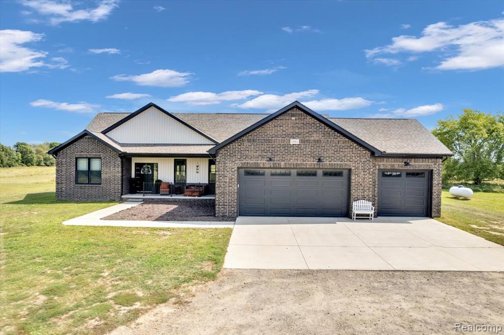 Welcome to this stunning 2022-built home, nestled on over 23 acres of private countryside living. Designed with modern comfort and timeless farmhouse style, this property offers a rare blend of luxury, space, and convenience.
Step inside to an open-concept floor plan where natural light pours across the main living area. The gourmet kitchen features a massive island with granite countertops, stainless steel appliances including a line fridge, and a spacious walk-in pantry. Farmhouse-style doors, upgraded trim, and thoughtful details carry throughout.
The home offers 4 bedrooms and 3 bathrooms, with large bedrooms and custom closet shelving providing ample storage. The oversized first-floor laundry includes built-in lockers, making everyday living easy and organized. As a smart home, enjoy voice-activated lighting, automatic smart locks, and a smart garage door for peace of mind and convenience.
The finished basement expands the living space with a fourth bedroom and full bathroom perfect for guests or extended family. Additional upgrades include a Wolverine water system with reverse osmosis for pristine water quality.
Outdoors, relax in your hot tub lanai, enjoy summer days in the above-ground pool, or simply take in the breathtaking acreage surrounding you. The attached 3 car garage offers plenty of room for vehicles and equipment.
This home is truly move in ready, and with sellers relocating out-of-state, all furnishings are negotiable. A modern country retreat with every upgrade don’t miss your chance to make it yours.