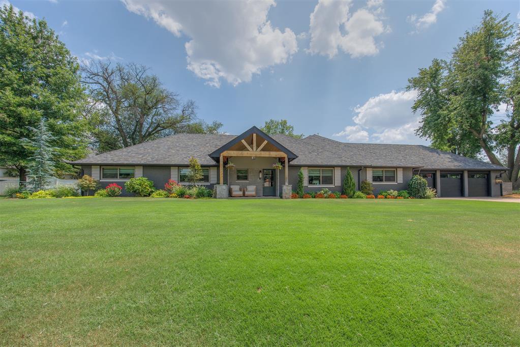 Balancing 1950s architectural character with flawless modern execution, this fully reimagined estate offers an unparalleled living experience sitting on over 1/2 an acre just off Campus. Natural light floods the open-concept living spaces, drawing your eye to the exquisite masonry fireplace and meticulous carpentry details that adorn the walls.The kitchen is a chef’s dream, meticulously appointed with floor-to-ceiling cabinetry, a custom-crafted vent hood, a pot filler, and smart Cafe appliances, instant hot water tap & more. Clever luxuries—like the appliance garage, built-in coffee station water lines, and specialized task lighting—ensure a clutter-free aesthetic. Peacefully positioned at the rear of the home, the primary suite features warm hardwoods and a luxurious wet-room bath with heated tile underfoot and a custom vanity setup. Three beautifully proportioned secondary bedrooms are complemented by a spare bath that continues the high-end finishes w/ deep soaking tub. In the back of the House you're able to imagine the space with all the possibilities from a luminous reading niche and a poolside bonus studio or game room.Outside, the property transforms into a private resort, showcasing a newer saltwater pool, spa, slide, and safety-gated grounds. The entirely redesigned landscape features curated perennial gardens that promise effortless beauty season after season, sustained by an independent water well. A truly rare offering. Full upgrade list available upon request. Broker/Owner.