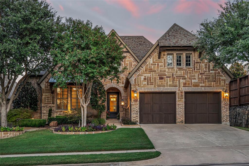 Discover tranquil luxury in this immaculate 3-bedroom, 3-bathroom home where sophisticated design meets effortless entertaining. Step through the foyer into an open-concept masterpiece where the gourmet kitchen takes center stage. Pristine white custom cabinetry frames professional-grade appliances including a KitchenAid 6-burner gas range with griddle, double ovens, and wine chiller. The dramatic black granite island with farm sink and designer nickel fixtures creates the perfect gathering space, while the adjacent dining room sparkles under its gorgeous chandelier.
The family room beckons with its custom cast stone fireplace and seamless flow to your private backyard oasis. Retreat to the luxurious primary suite featuring plush carpeting, designer lighting, and a spa-inspired en-suite with a grande vanity, custom dry bar, soaking tub, walk-in glass shower, and generous closet.
A private study with French door entry provides the ideal work-from-home sanctuary, while two additional bedrooms offer comfort for family and guests.
Step outside to your personal resort featuring a covered patio with floor-to-ceiling brick fireplace, complete outdoor kitchen with gas grill, griddle, and beverage refrigerator with bar seating. The open patio area invites gatherings around the custom fire pit or Kamado Joe Egg for the ultimate culinary experience.
This meticulously maintained home combines indoor elegance with outdoor entertainment, creating an unparalleled lifestyle opportunity in the coveted Villas of Voltera. Your tranquil retreat awaits.