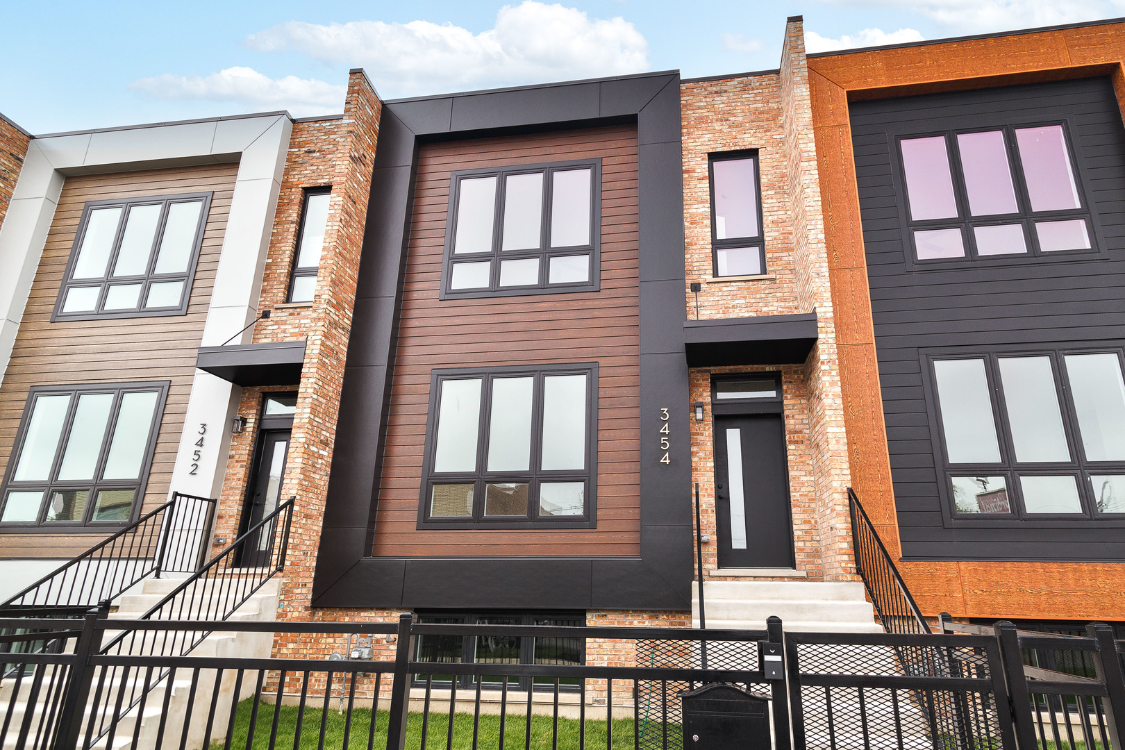 5 of 9 homes SOLD! Modern new construction row-home project in Portage Park, "9 on Central" by top Chicago developer. Sun filled open concept main level features spacious living/dining area with oversized front windows and natural hardwood flooring throughout. Adjoining eat-in kitchen with stainless steel KitchenAid appliance package, soft close shaker cabinetry with glass transoms and under counter lighting, quartz countertops, island, breakfast bar, pantry, and exit to backyard. Bright and spacious primary suite with WIC and private bath featuring a frameless glass shower and dual vanity. Two additional bedrooms, full guest bath with tub and dual vanity, and laundry with washer/dryer complete the upper level. Sunny lower level with family room featuring wet bar and beverage center, 4th bedroom, full bath with frameless glass shower, and utilities. On trend design features and tons of natural light! Enclosed yard and detached two-car garage. Conveniently located near restaurants, shopping, entertainment, parks, public transportation, and more!