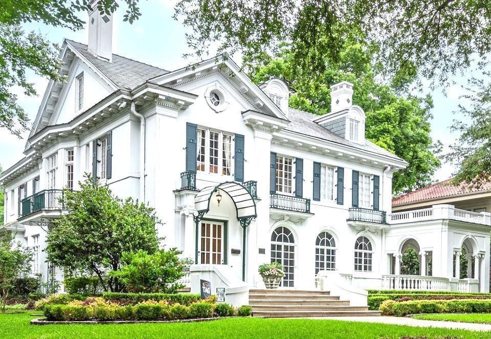 This magnificent Estate designed by the renowned architect Hal Thompson stands as a true designated Dallas landmark. With it's unparalleled charm it is a once in a lifetime opportunity to call home. They don't build homes with these materials & such incredible craftsmanship anymore. In 2012 the  home was brought into todays standards while keeping many original fixtures in place!  Most of the plumbing & electrical as well as 4 zoned HVAC units, furnaces, tankless water heater, roof under lament & much more. This home has been featured in magazines, newspapers & videos on social media due to it's elegance & location on prestigious Swiss Ave. It was appraised last May for 3.25 million! Guest house adds an additional approx. 880 sq ft & adds 2 more bedrooms, full bath, kitchen & 2nd full size laundry area & an original 1916 telephone! The main house grand great room has Venetian plaster walls & sunroom over looking a secret garden. Elegant formal dining has original chandeliers & sconces. Interior is adorned with soaring ceilings, oak hardwoods, dentate ceiling crown molding, handcrafted fireplaces & many steel casement windows all culminating elegance & sophistication. Gourmet kitchen with 2 sinks, 2 dw, Wolf range, dbl ovens, microwave, warming drawer, quartzite counters, hidden sect desk, walk-in pantry, glass-front cabinets with lighting, ice maker, large & mini refrig & more. Primary suite with 4 closets, fireplace & bath with heated floors, luxury duo shower with rain & sauna features & heated tub. Sonos system serves many rooms & primary suite has separate sound for the shower. Huge media rm. with mini fridge, microwave & theater equip. An ELEVATOR services the 1st & 2nd floor. Exterior with extensive landscaping, side Loggia patio, grand front walkway lit by tree-mounted spotlights, & a matching chicken coop. Sparkling pool, hot tub, landscaping, lighting & more. Dog shower & outdoor shower are adjacent to the pool area. See the feature list & remodel pages.