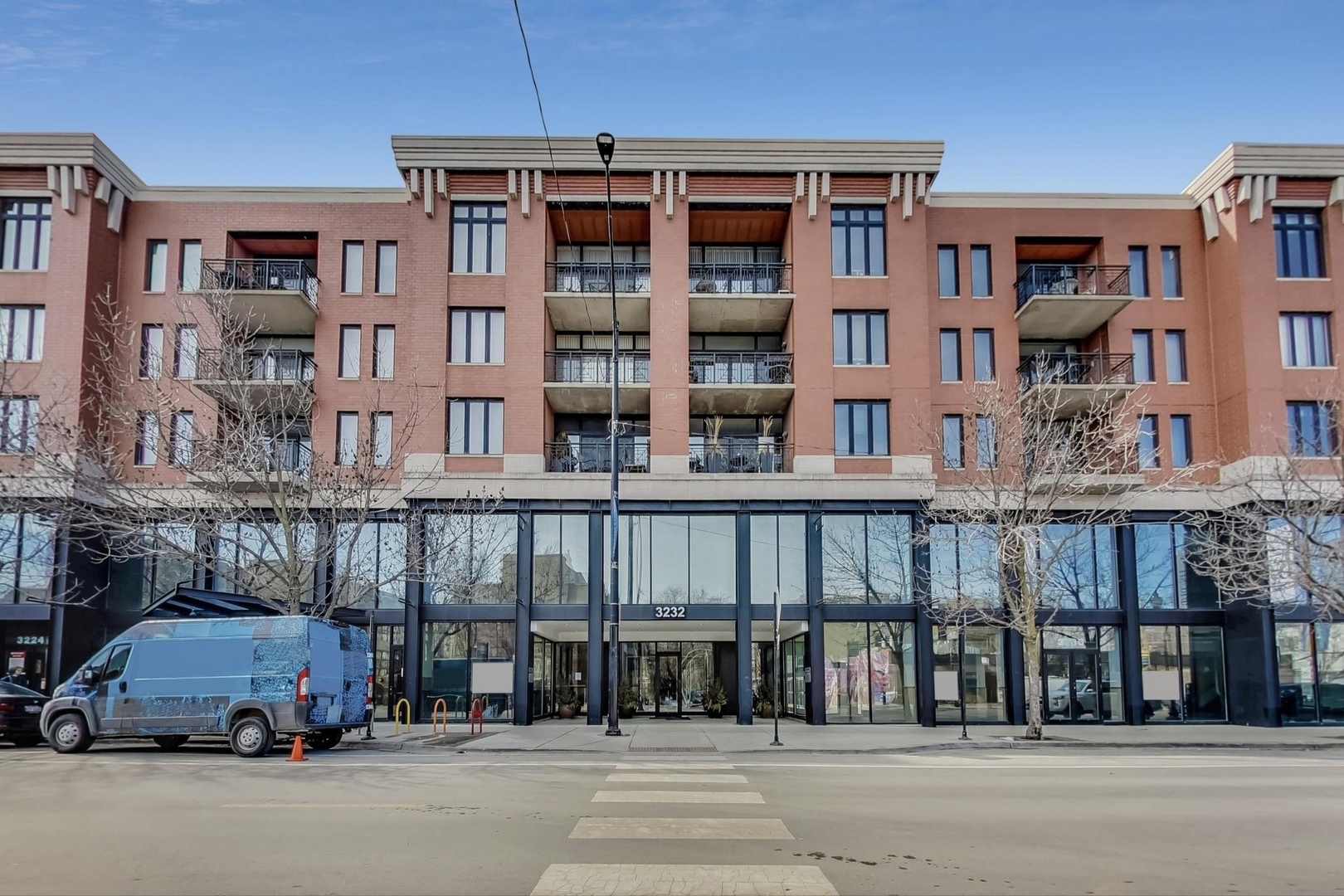 EAST LAKEVIEW - PLAZA32 - PRIME LOCATION.  This beautiful home overlooks the tree-lined park and does not face Halsted.    Stunning, renovated one bedroom, one bath with a balcony and heated garage parking space #126 is included in a boutique elevator building with 24-hour door staff.  Beautiful kitchen with granite countertops, stainless steel appliances, and 42" Solid wood cabinetry with pull out shelves and soft close drawers.  The spacious bathroom features porcelain heated tile floors, soaking tub/shower, and a custom cherry wood vanity w/marble top and an oversized under mount sink.   Beautiful living room with designer lighting, marble gas fireplace, custom window treatments and wire for sound.  Walk-in laundry room with front load washer/dryer and storage shelving.   The building has a beautiful large common landscaped park. Assessments include nearly everything: All gas (heat & cooking), water (hot & cold), ASTOUND/RCN Digital TV with HBO MAX, and two TIVO HD DVRs, and high-speed internet/Wi-Fi included!!  Storage cage included. Dog and cat friendly, building has a private dog run/park. Close to the lakefront, Target, Whole Foods, Mariano's, CTA-Belmont stop, Starbucks, shopping, & restaurants. Extremely well-managed building.