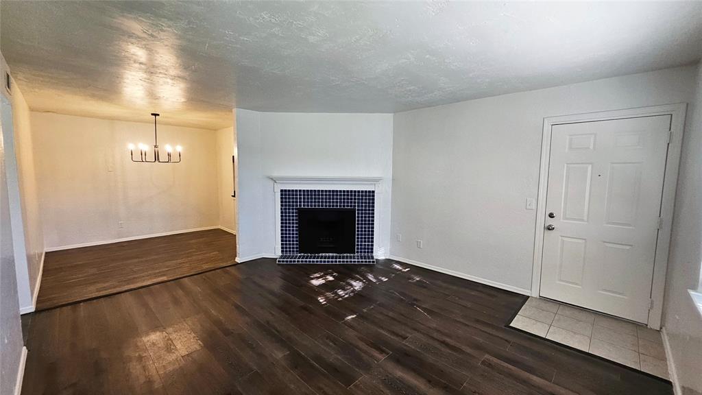 Charming 2-bedroom, 1.5-bath upstairs condo in Building 29. Recently updated with fresh interior paint, new light fixtures, and ceiling fans with lights in both bedrooms. The kitchen has been refreshed and sits just off a large dining area, making it convenient for meals and gatherings. The living room offers a cozy fireplace, and both bedrooms are well-sized with plenty of closet space. Additional storage is found throughout the unit, along with washer/dryer hookups. A community garden is located at the corner of the building, and a park sits directly behind the property. Reach out today for your private showing appointment!
