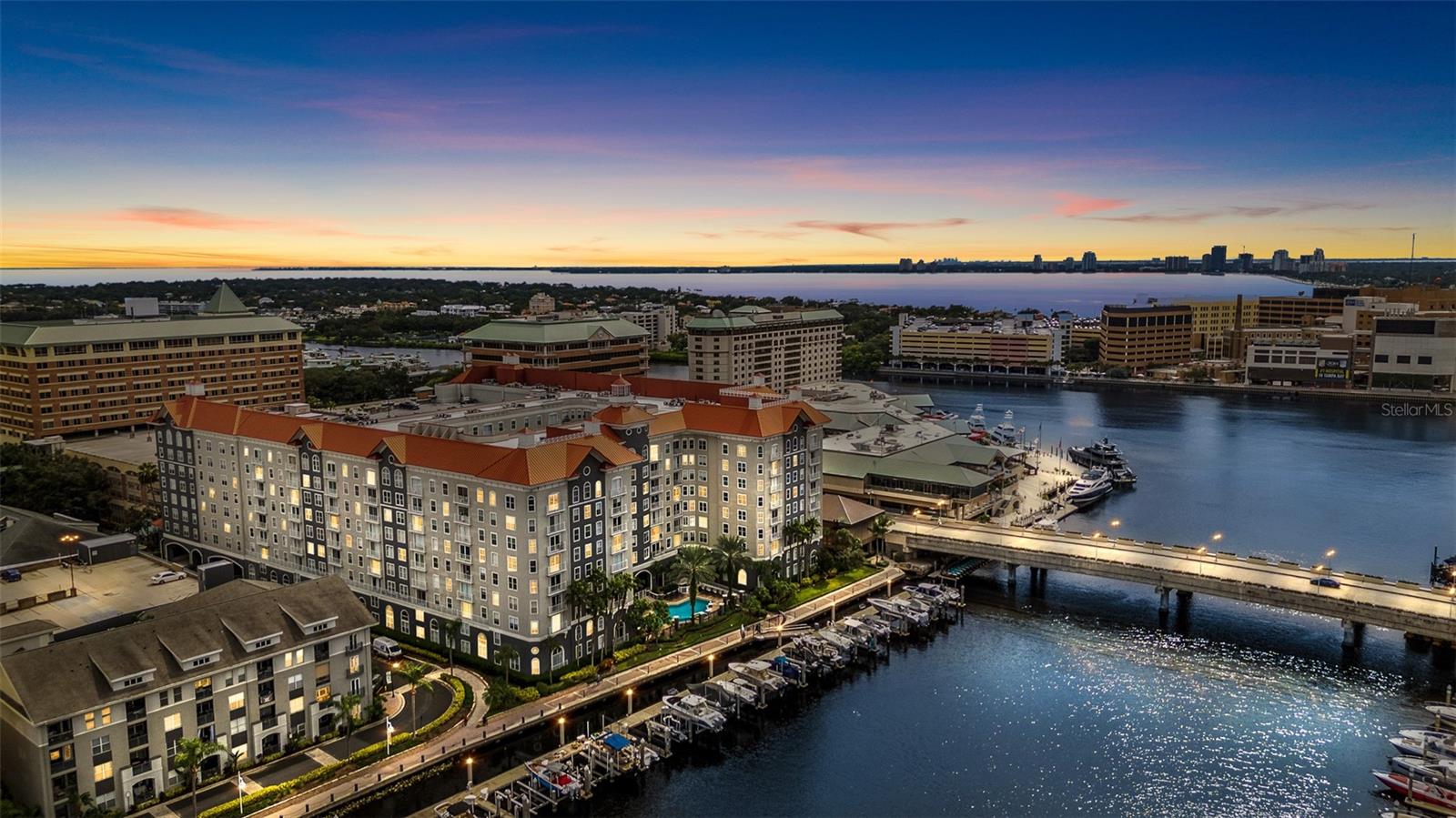 One or more photo(s) has been virtually staged. Experience resort-style living at Parkcrest on Harbour Island in this beautifully updated 2-bedroom, 2-bath condo offering just under 1,200 sq. ft. of thoughtfully designed space. The open floor plan showcases stylish wood-look tile flooring throughout and a stunning chef’s kitchen with a massive island, soft-close cabinetry, and ample storage. The spacious primary suite features two closets for added convenience, while the second bedroom boasts a generous walk-in closet—perfect for guests or a home office.

Set within one of Tampa’s most sought-after waterfront communities, Parkcrest provides 24/7 security, a resort-style pool and spa, fitness center, clubroom, and access to the vibrant Harbour Island lifestyle. Just steps from Tampa’s Riverwalk, Benchmark International Arena, and the best dining and entertainment downtown has to offer, this condo perfectly blends modern comfort with urban convenience.