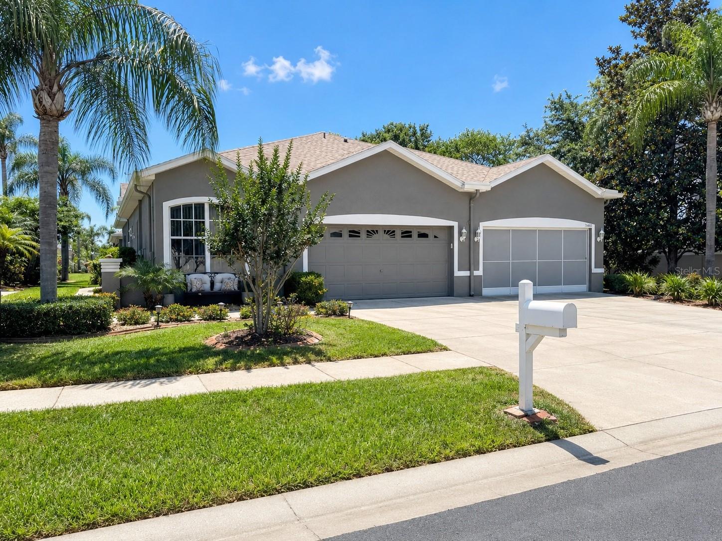 Welcome to this exquisitely reimagined 3 bedroom, 2 bath villa located in the highly sought after gated golf course community of Summertree, where resort style, maintenance free living meets comfort, elegance, and convenience. This beautifully updated home showcases quality upgrades throughout and offers the perfect blend of modern style and easy Florida living.The stunning remodeled kitchen (2021) features 42-inch solid wood soft-close cabinetry, sleek stainless steel appliances, solid-surface countertops, and abundant storage designed to impress both everyday living and entertaining alike. Luxury vinyl plank flooring installed in 2021 flows seamlessly throughout the home, complemented by a soft, modern interior color palette updated in 2021. The beautifully renovated bathrooms feature wood cabinetry with elegant granite countertops, adding a touch of luxury to every space.Major updates provide peace of mind including a new roof (2022), exterior paint (2023), and water heater (2025). Furniture is negotiable, making this exceptional villa truly move-in ready.Residents of Summertree enjoy an active lifestyle with incredible amenities including a gated entrance, golf course community setting, beautifully appointed clubhouse, social clubs and activities, fitness center, heated pool and hot tub, game room, card room, bocce ball, handball, tennis courts, and shuffleboard.Low HOA fees include lawn maintenance, trash service, cable, front lawn irrigation, exterior painting, and roof replacement allowing you to enjoy worry free living year-round.Ideally located near the Suncoast Parkway with convenient access to Tampa, beaches, shopping, dining, medical facilities, and entertainment. This is your opportunity to own a beautifully upgraded villa in one of the area’s most desirable communities. Schedule your private showing today!