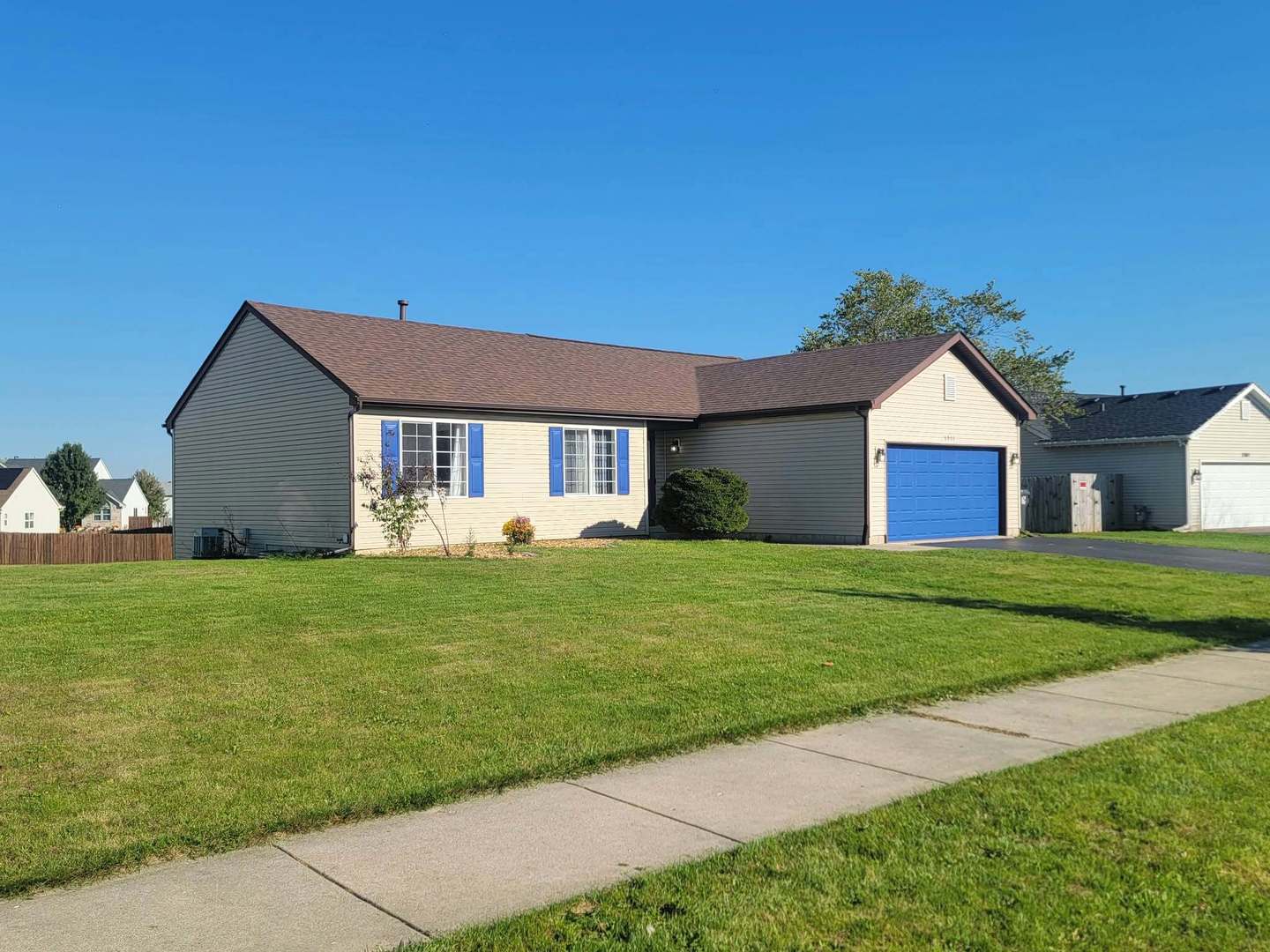 Offered for the first time since it was built, this 3-bedroom, 2-full-bath home has been cared for by its original owner. The open main living area makes an impression with its dramatic cathedral ceiling finished in warm wood planks, while the brick fireplace adds a welcoming focal point. The kitchen features maple cabinets, granite countertops and stainless-steel appliances, with an easy connection to the dining and living spaces.    The home offers 1,311 square feet of living space, plus a 1,296-square-foot lookout basement with full-size windows and excellent potential for future finished living, recreation, work, or hobby space. Outside, enjoy the generous 0.33-acre corner lot, with a deck, broad lawn, and backyard fire pit. A two-car garage adds everyday convenience.