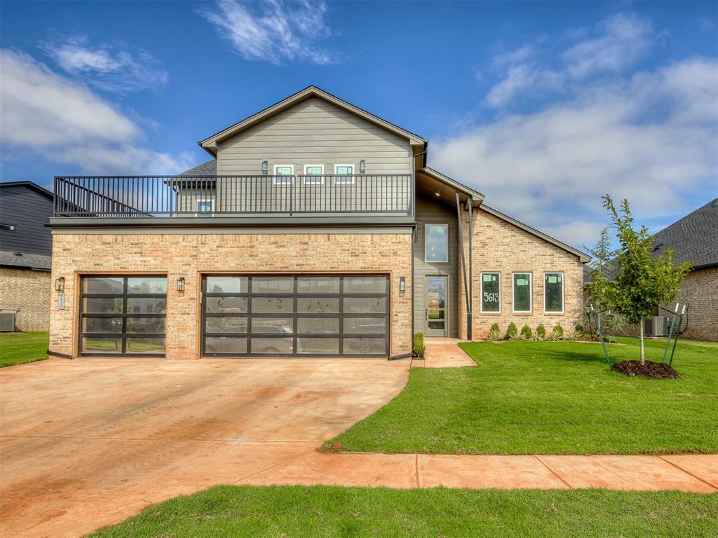 Looking for a TRUE second living space? The upstairs features a BONUS + KITCHENETTE + JR SUITE + 20 PERSON BALCONY! Welcome to Echo Park, a new community at NW 150th & MacArthur minutes from the best hospitals, dining and shopping the metro has to offer as well as in the Deer Creek school district. Enjoy an upgraded window package, finishes you won't find in your neighbors home & a gas stove top! Downstairs you'll find the primary with double *separate* sinks, walk in shower, modern free standing tub & an oversized closet with shoe racks & a full length mirror! The two secondary bedrooms share a bathroom, there's a study at the front of the home with a 1/2 bath & spacious laundry room. Urban Nest Homes builds to the highest standards of quality, with an engineered post-tension foundation, a 96% efficient HVAC system with a whole-home air filtration upgrade and an exterior fresh air intake, tankless water heater, extra insulation, Hardie siding and trim, upgraded windows, premium plumbing and light fixtures and so much more! Echo Park will have a playground, basketball court, swimming pool, clubhouse, and walking trail.