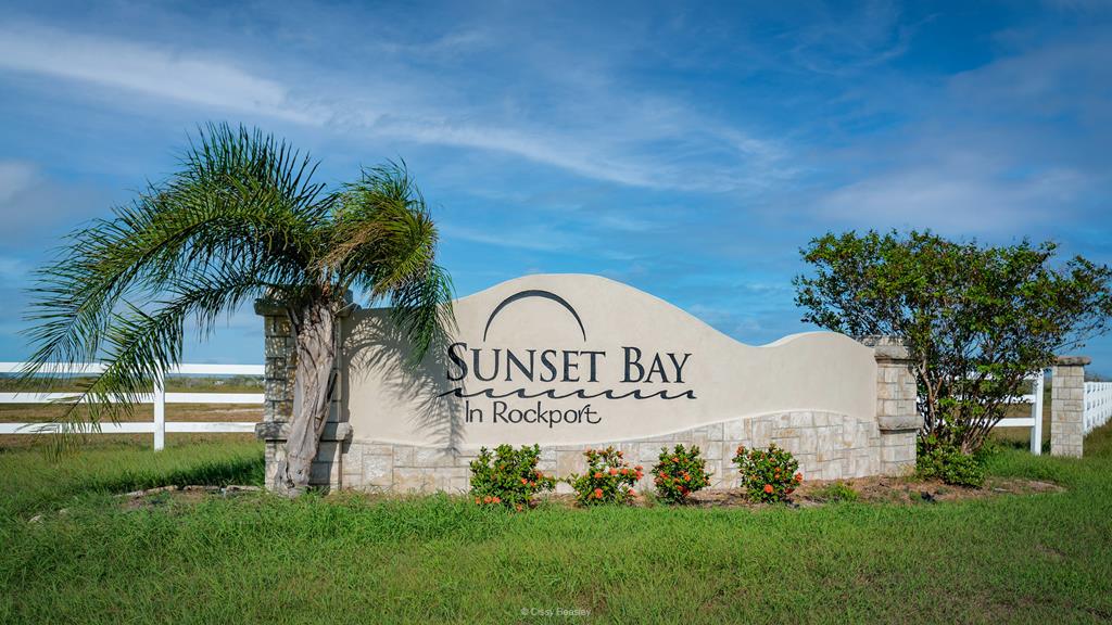 The best of both worlds!!! Spacious, privacy with 2 acre homesite that is just minutes away from the conveniences of Rockport!!! Sunset Bay offers a unique coastal lifestyle of relaxation and tranquility to build your dream home. Homeowners enjoy the private pier into Puerto Bay, pond, picnic area and central mailboxes. Minimum home size of 1,400 square feet. All lots are serviced by Quadvest water system and aerobic septic system required. For more information visit www.sunsetbaypoa.org.  For Sale sign is in approximate location.