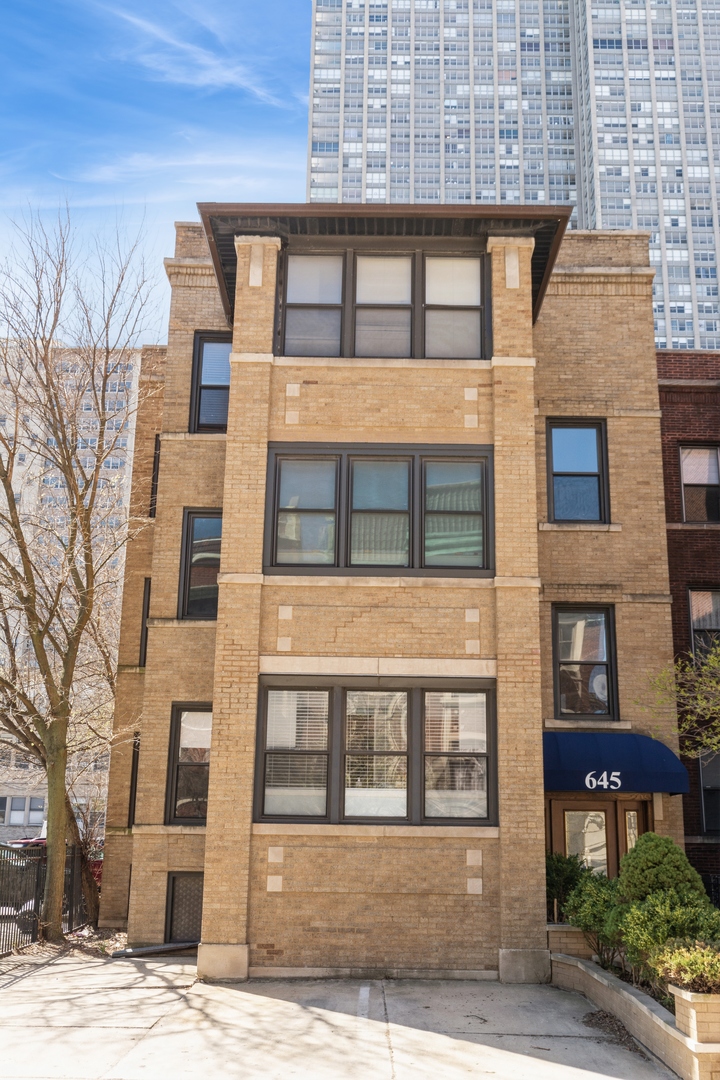 STEPS FROM THE LAKE! Chicago's lakefront living at its best! 3 bedroom/2 bath with rights to duplex down (giving approx 1000 sqft extra space) consists of a sun filled, spacious floor plan with generous sized rooms, hardwood floors throughout, south facing living room with gas fireplace, stainless steel appliances, in-unit W/D, a balcony, a deck, and parking space included. In 2024 new GFA/CA and also recently completed tearing off roof, and replacement was done with insulation. Close to Whole Foods, Jewel, restaurants, Wrigley Field, Sydney Marovitz Golf Course, Montrose Beach/Dog Beach, Lakeshore Drive, and public transportation. Low assessments and pets welcome!