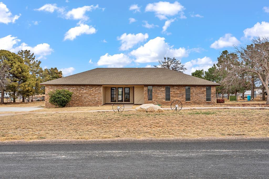 Enjoy peaceful country living while being just minutes away from shopping and dining. Set on nearly 1.5 acres, this home has country charm with updates in just the right places. With over 2,000 sq ft  there is plenty of space and storage to make it your own. The primary suite includes a sunroom  with beautiful views to your private pond and direct patio access- perfect for your morning coffee! Outdoors you'll find a storage building, pipe fencing for livestock, a concrete pad for your RV or whatever your heart desires. This one is a must see. Call your realtor today to schedule a showing!