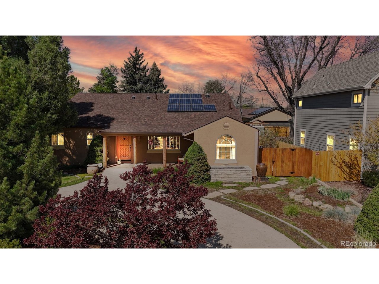 Charming four-bedroom, three-bathroom ranch home in University Hills! This home underwent extensive remodeling adding a large Family room with soaring ceilings, a dedicated laundry room, and a primary suite with an ensuite bathroom and walk-in closet. French doors access your private patio where you can relax with your morning coffee or wind down in the evenings. All 2,495 square feet are on the main level featuring a formal living and dining room, a private office with a three-quarter bathroom (which can serve as a guest suite), hardwood floors, stainless steel appliances, and much more! Mechanically, the furnace was replaced in 2025, the water heater was replaced with a Rinnai Tankless unit, the roof was replaced in 2021, and the owned solar system has covered the current owners' electric bills. Plenty of parking is available, featuring a horseshoe driveway in the front of the home and an oversized two-car garage with additional storage space. Centrally located near I-25 for easy work commutes or travel, it is also just down the street from the High Line Canal trail system and the Eisenhower Recreation Center. Must see! Please call for a private showing.