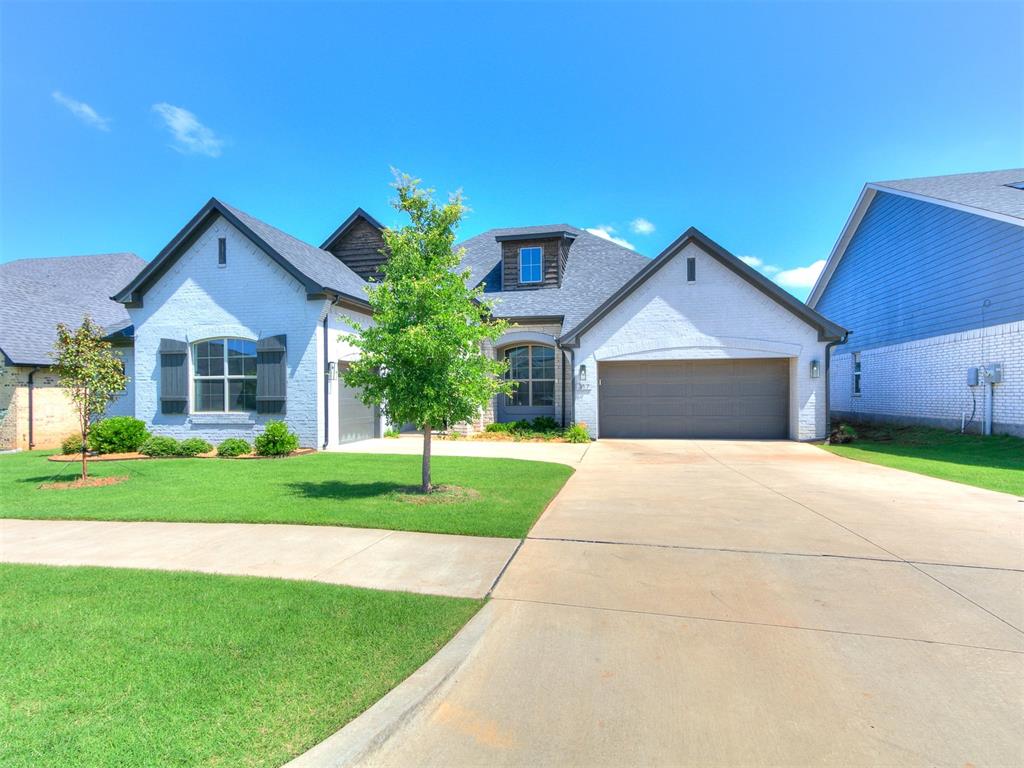 Beautifully located in north-central Norman, this light-filled home features an open-concept layout with floor-to-ceiling windows, spacious living and dining areas, and a well-equipped kitchen with ample storage and a large corner pantry. A versatile office with hardwood floors and a paneled ceiling can double as a playroom or gym. Enjoy serene views of a pond, walking trail, and open fields from the main living spaces. The primary suite offers private backyard access and a large walk-in closet. Includes a 2-car and separate 1-car garage, both with attic storage, plus an in-ground storm shelter. Just minutes from I-35 and shopping. Located in Little River Trails, a neighborhood with wooded trails, 2 ponds, a park, a pool, and a clubhouse with a fitness center.